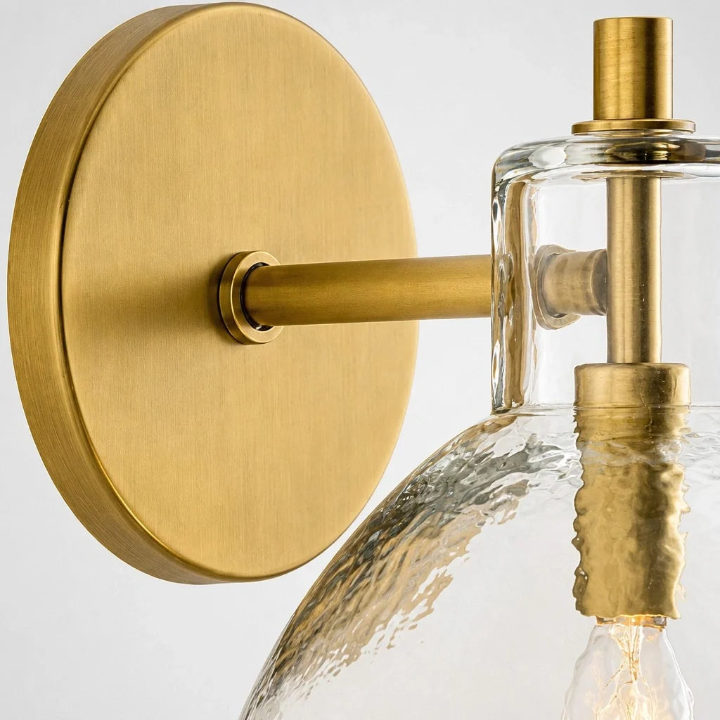 Close-up of the brass arm and hammered glass dome