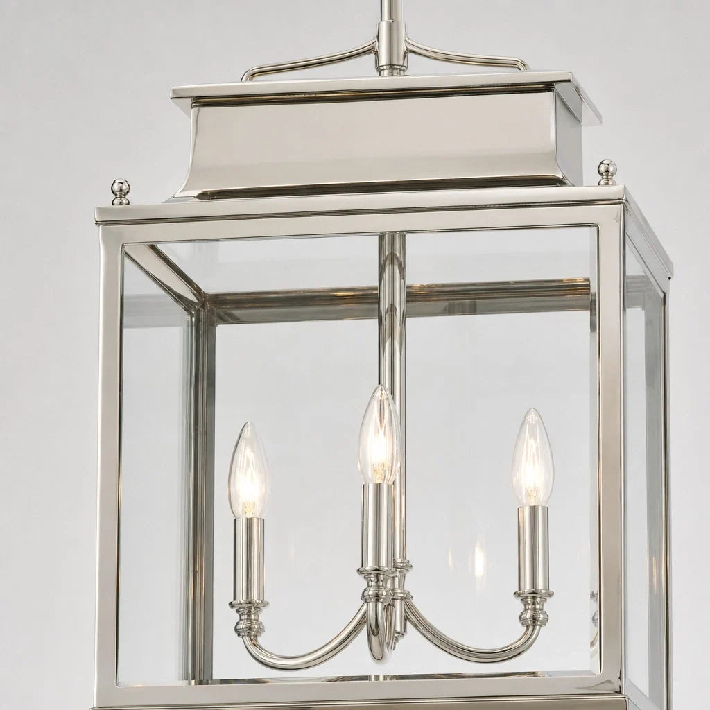 Close-up of the polished nickel lantern frame and candelabra arms