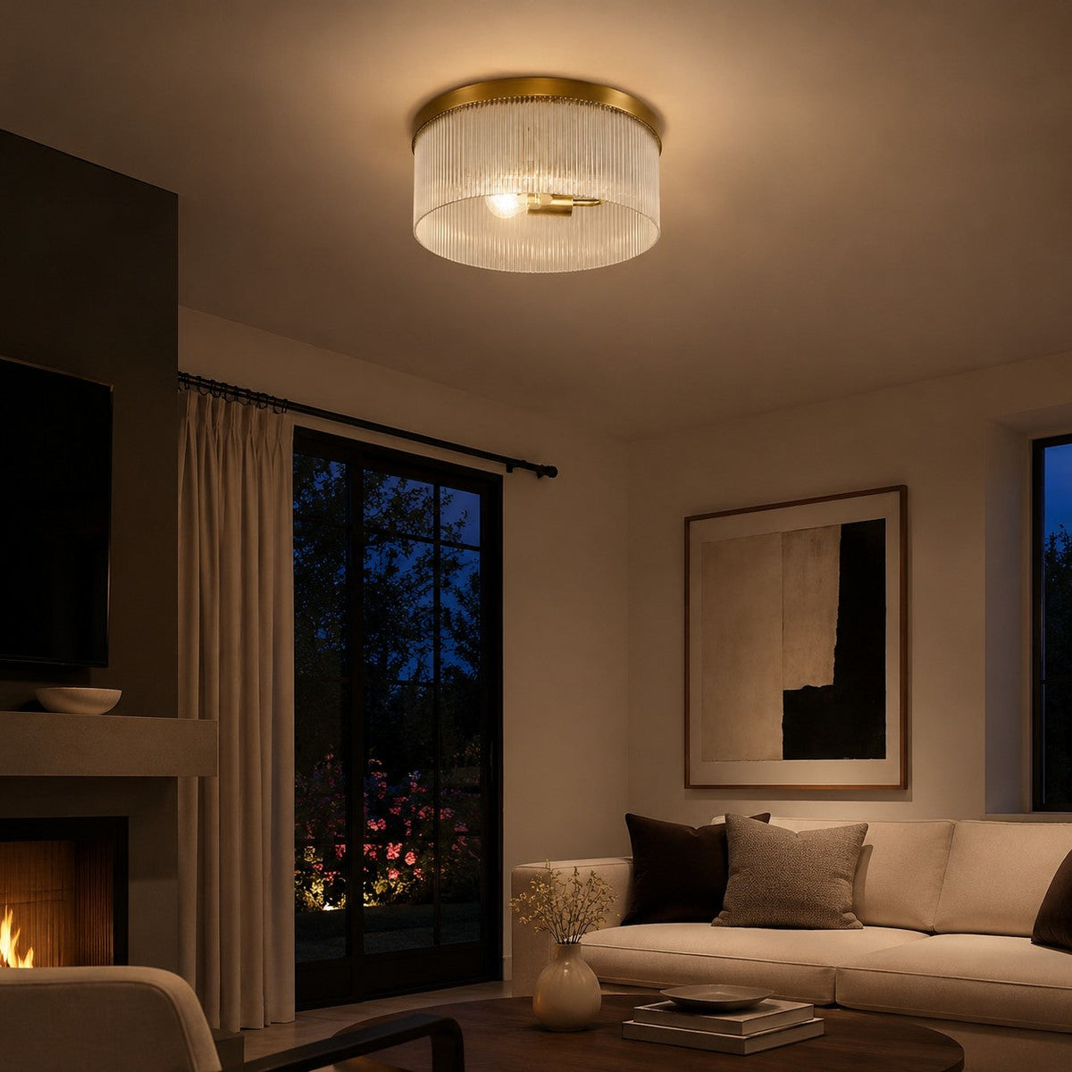 Tumbled brass ribbed glass flush mount in a living room by the fireplace in the evening