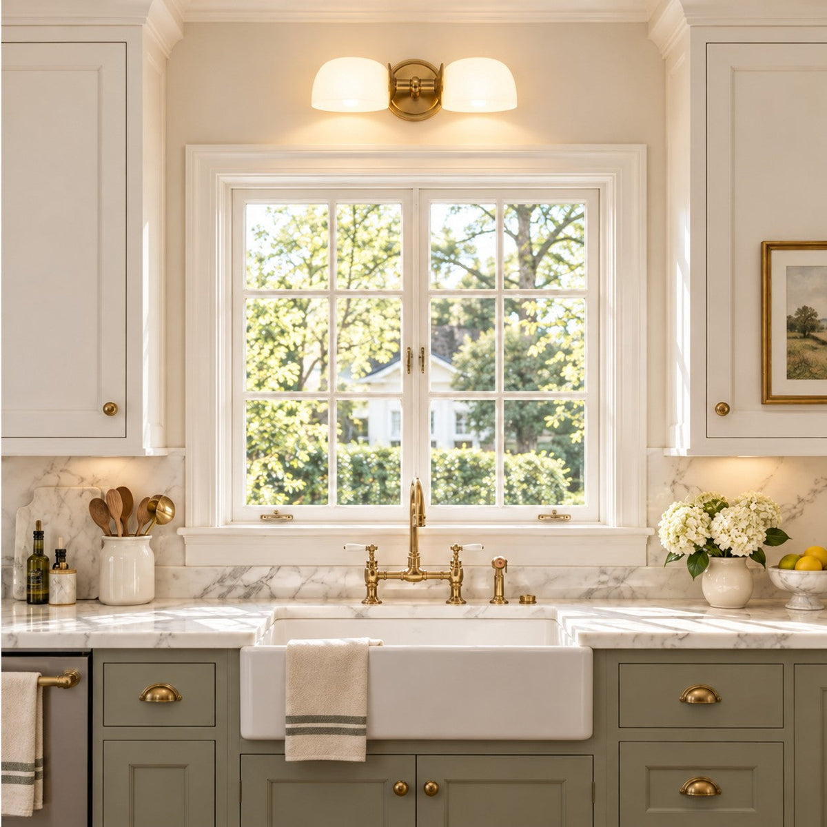 Tumbled brass double milk glass sconce above a farmhouse kitchen sink window