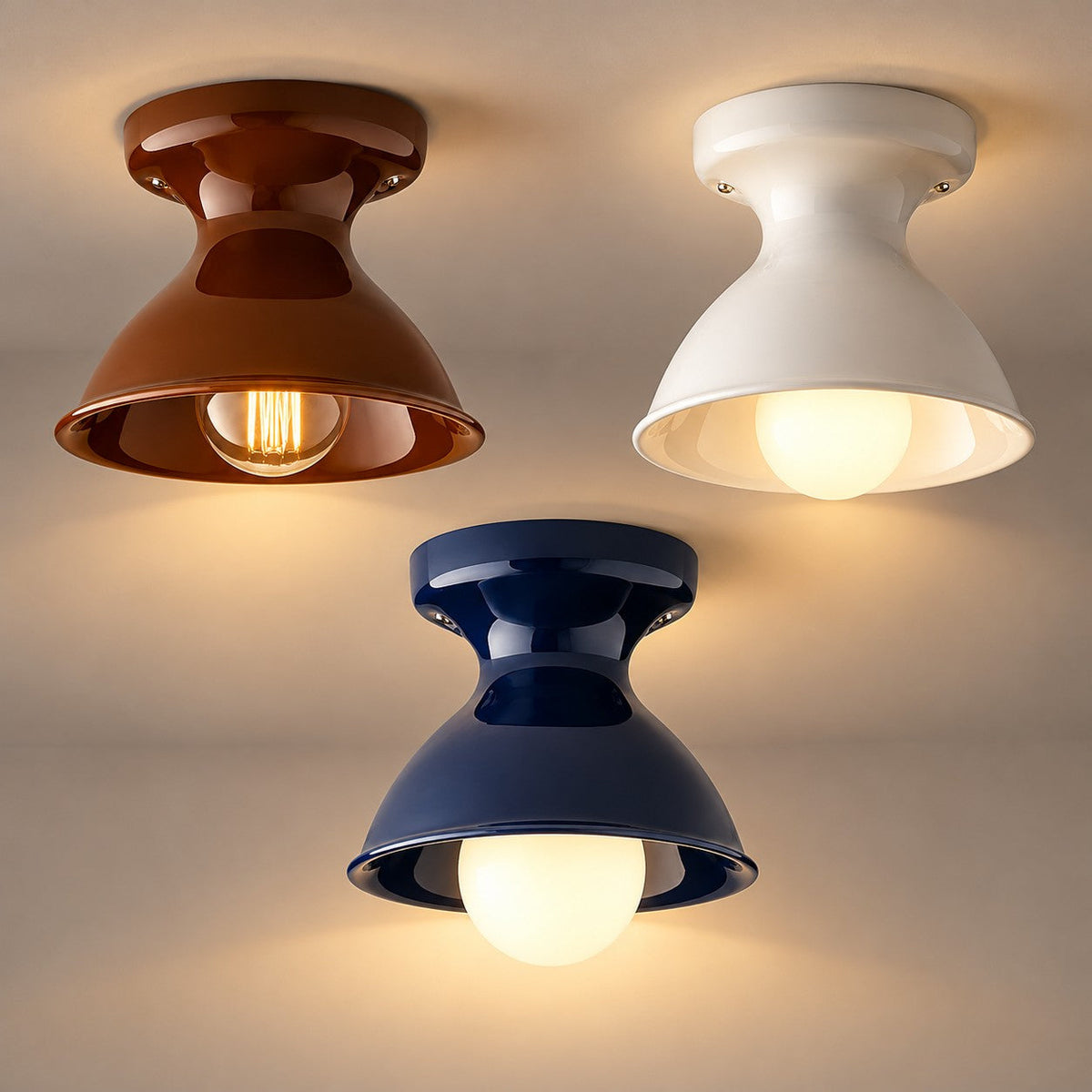 Auburn, white and navy ceramic flush mount ceiling lights glowing together