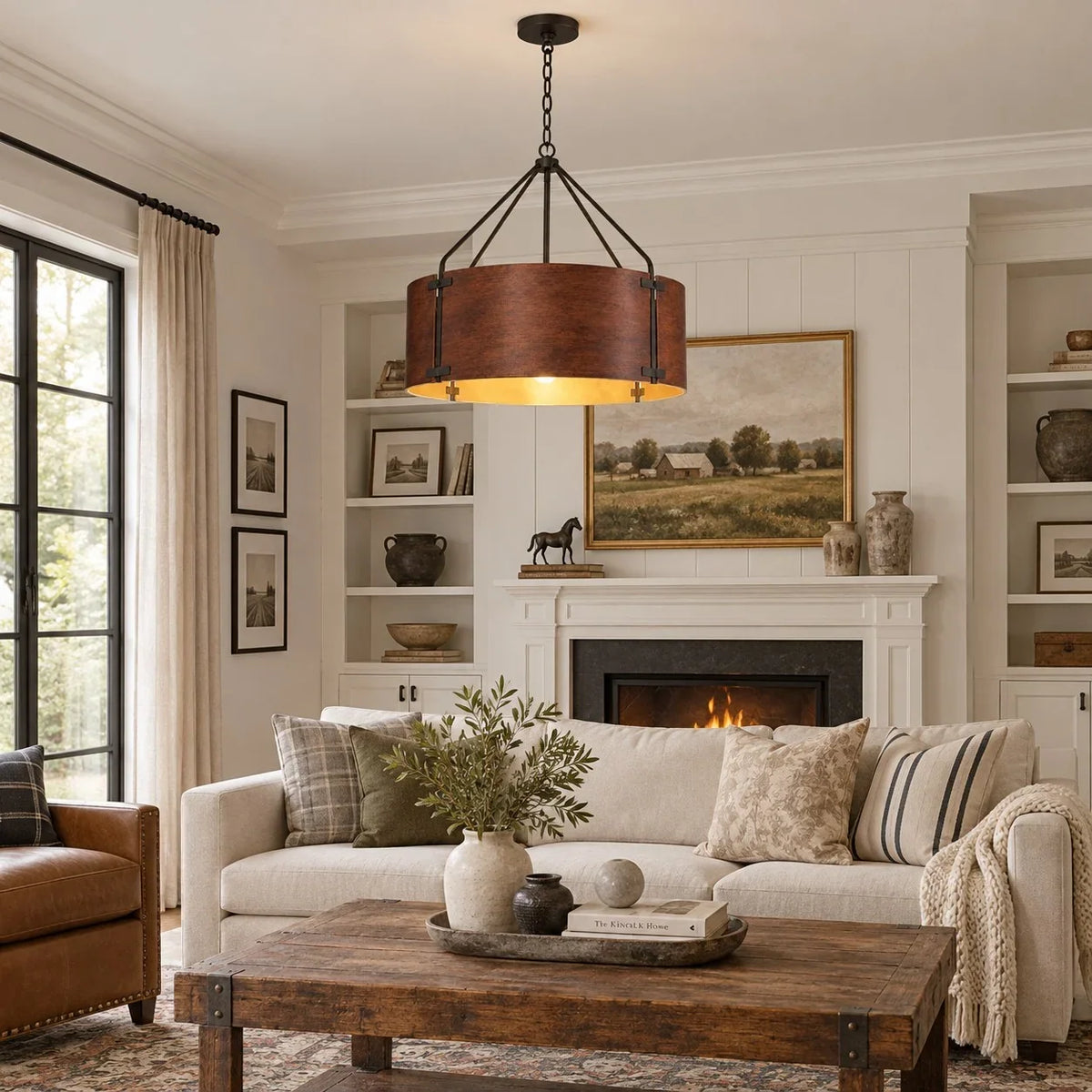 Tamburo bronze drum chandelier in a cozy farmhouse living room
