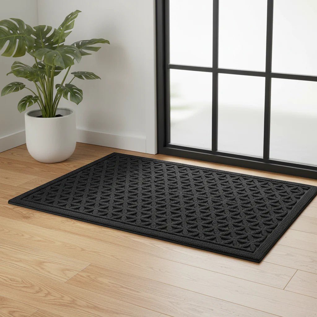 https://cdn.shopify.com/s/files/1/0655/0464/1076/files/3d-grooved-geometric-doormat-anti-slip-scraper-entrance-mat-4223218.jpg?v=1779807076