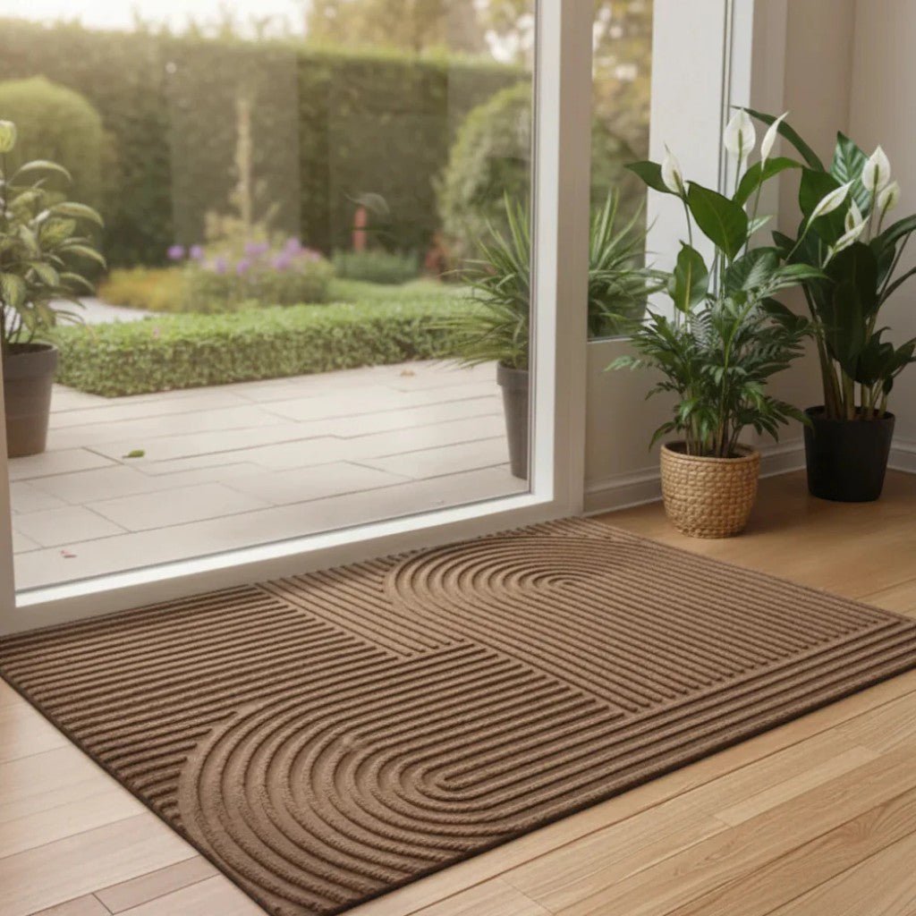https://cdn.shopify.com/s/files/1/0655/0464/1076/files/3d-grooved-geometric-doormat-anti-slip-scraper-entrance-mat-8403897.jpg?v=1779807075