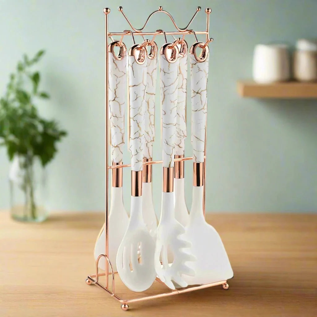 https://cdn.shopify.com/s/files/1/0655/0464/1076/files/7-piece-rose-gold-kitchen-utensil-set-with-stand-lattea-588962.webp?v=1750730550