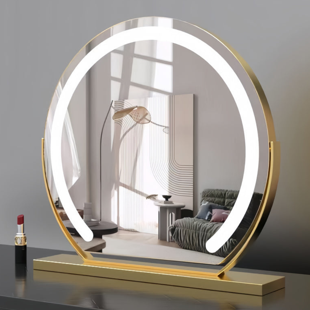 Bella Luce gold lighted vanity mirror on an elegant dressing table