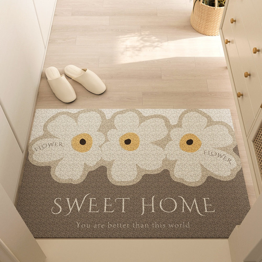 Daisy Sweet Home door mat in a bright hallway with slippers