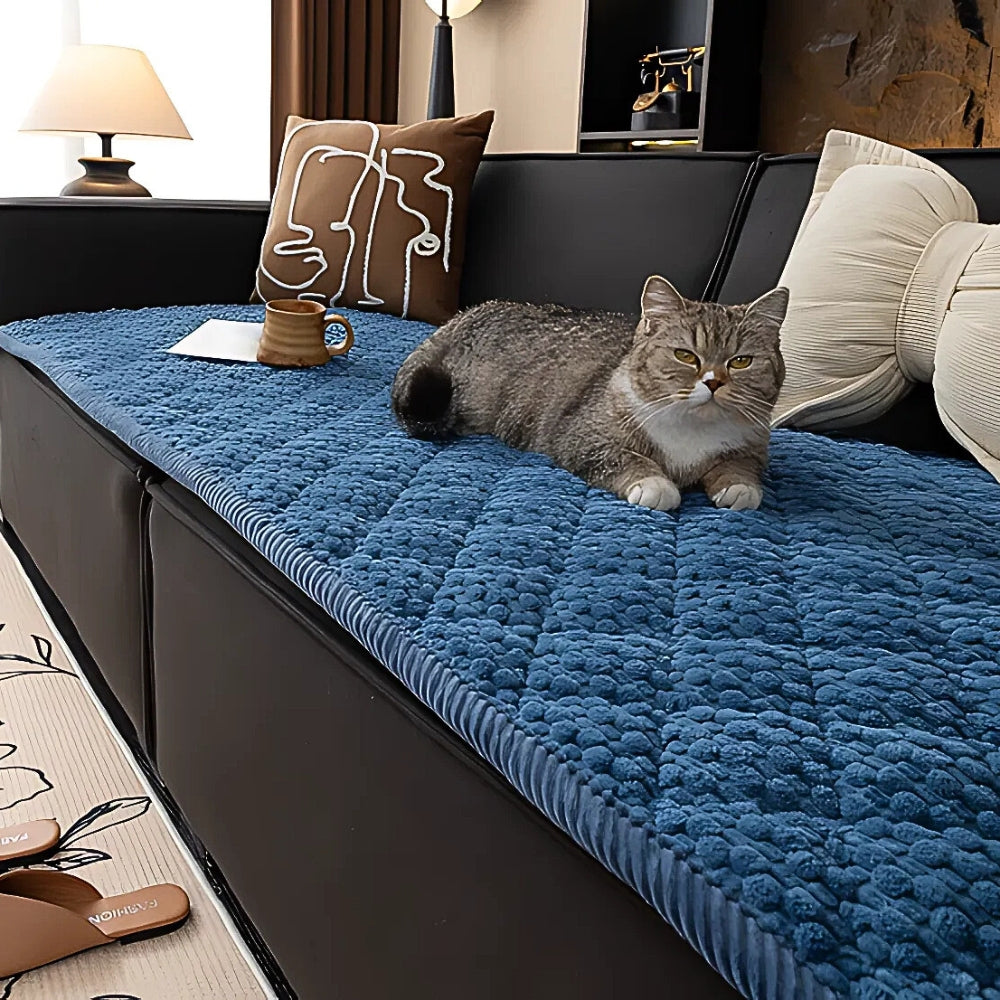 https://cdn.shopify.com/s/files/1/0637/4480/2863/files/Pet-ProofTexturedQuiltedSofaProtectorSlipcover_1.jpg?v=1755331398