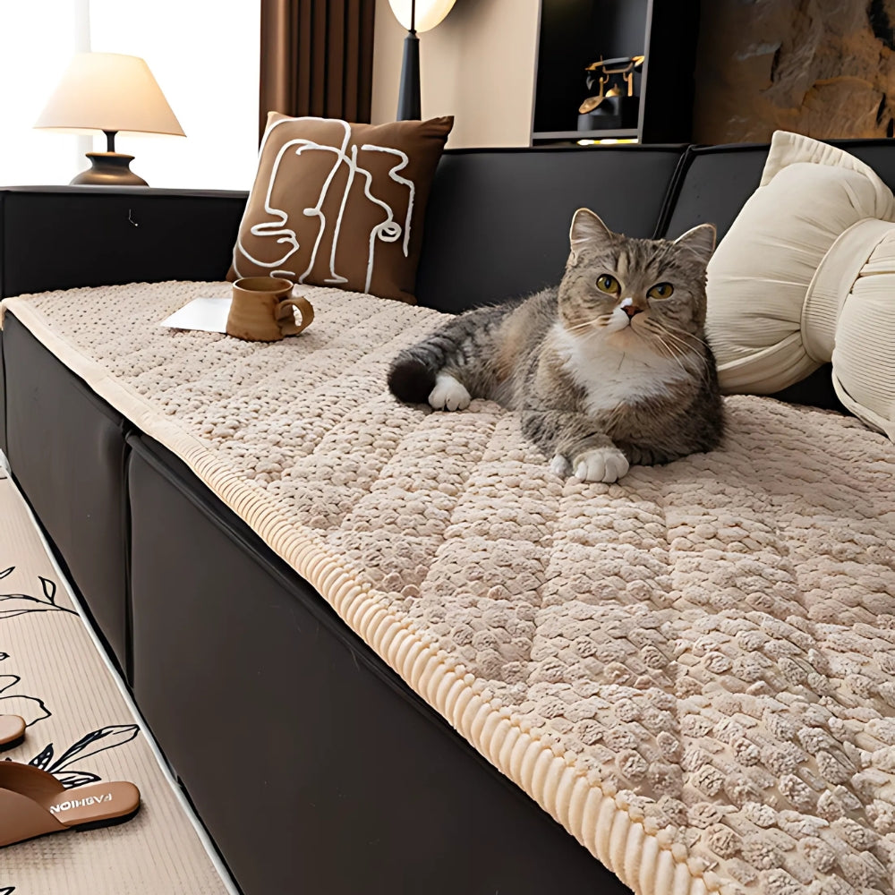 https://cdn.shopify.com/s/files/1/0637/4480/2863/files/Pet-ProofTexturedQuiltedSofaProtectorSlipcover_3.jpg?v=1755331399