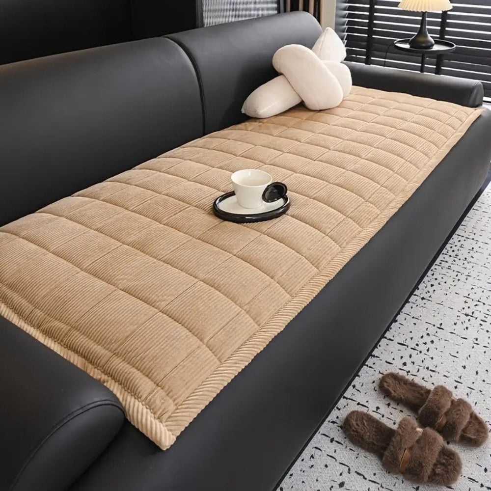 https://cdn.shopify.com/s/files/1/0637/4480/2863/files/QuiltedModernSofaCover_5_5ddcd32e-59e7-4da2-a1f2-65613d8deac5.jpg?v=1757056920