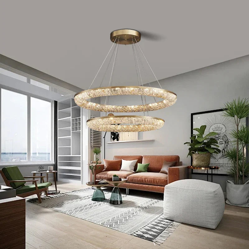 Stella Lucente gold crystal ring chandelier in a modern living room