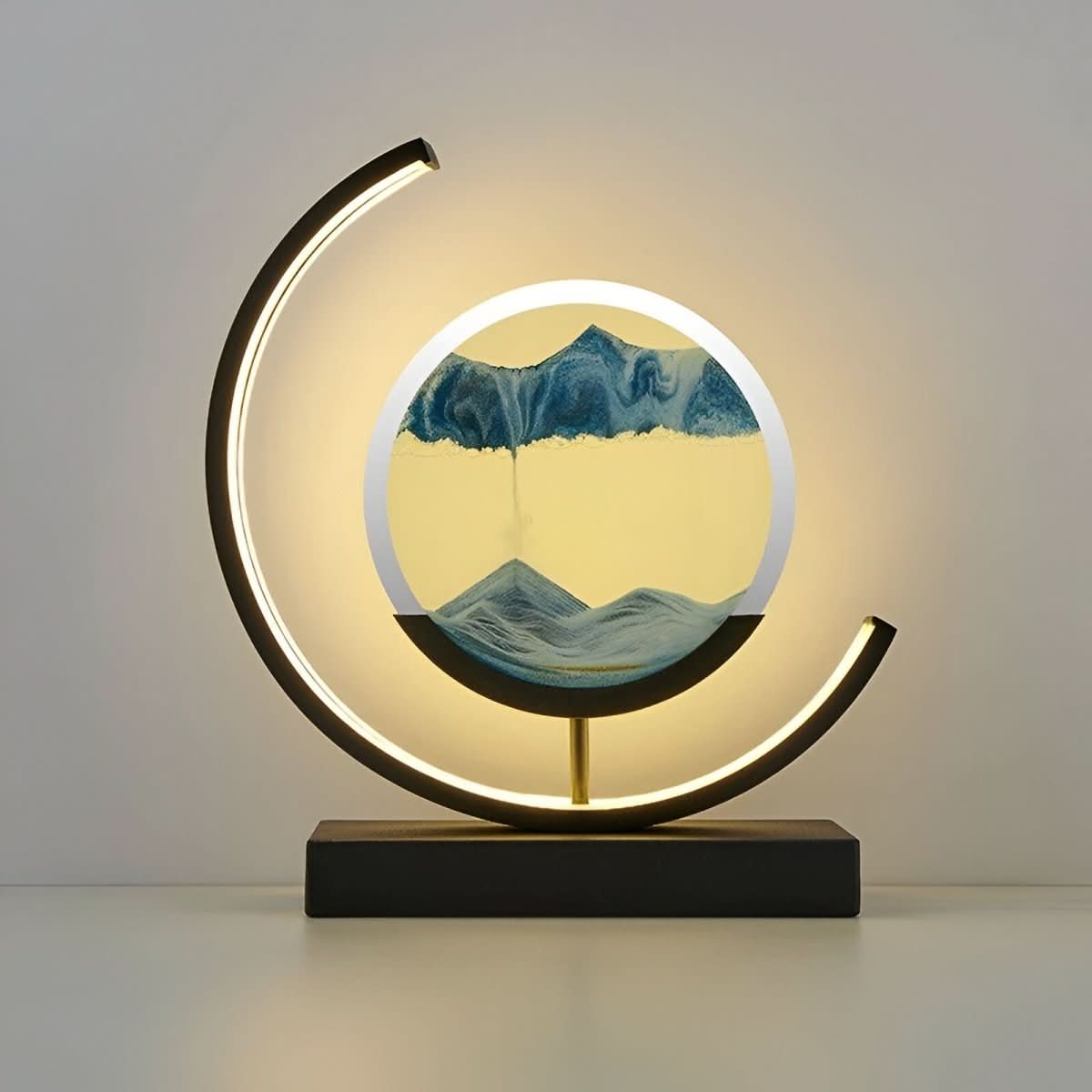 Blue sand art lamp glowing, product view