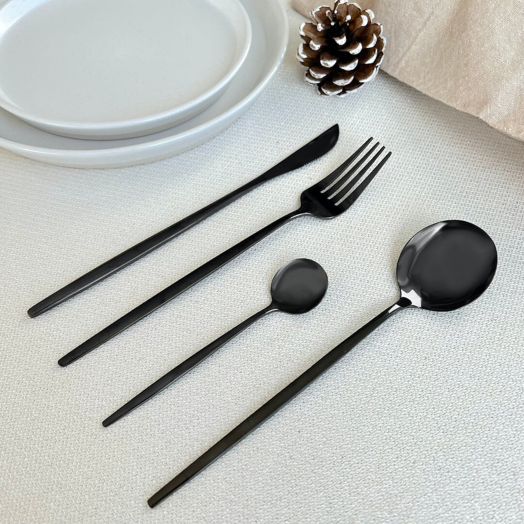https://cdn.shopify.com/s/files/1/0655/0464/1076/files/black-modern-flatware-24pc-set-450942.jpg?v=1750730513
