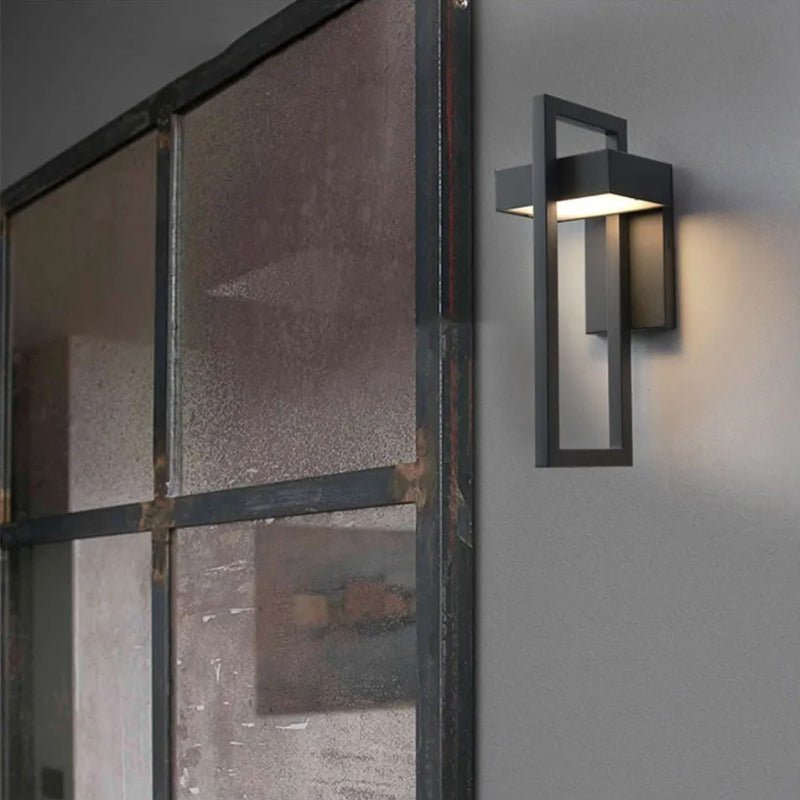 https://cdn.shopify.com/s/files/1/0655/0464/1076/files/black-up-down-outdoor-wall-light-330242.jpg?v=1773242651