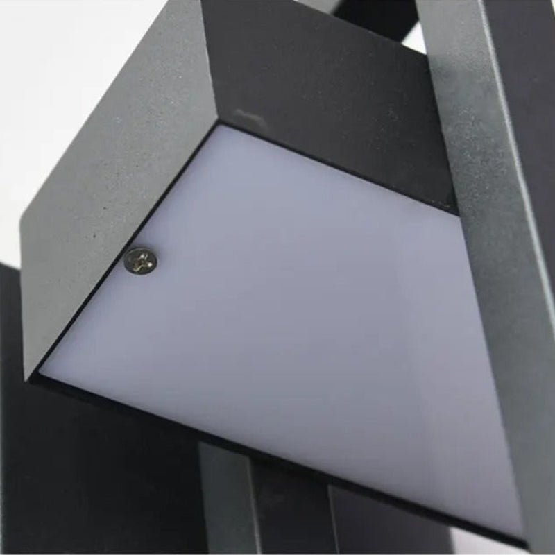 https://cdn.shopify.com/s/files/1/0655/0464/1076/files/black-up-down-outdoor-wall-light-503060.jpg?v=1773242651