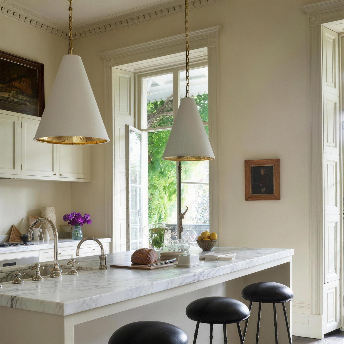 Calma Gessata plaster cone pendant with glowing gold-leaf interior in a classic kitchen