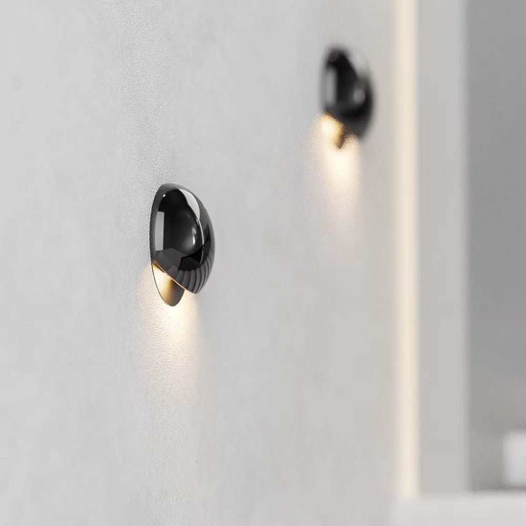 https://cdn.shopify.com/s/files/1/0655/0464/1076/files/eclipse-waterproof-modern-outdoor-wall-lamp-4174339.jpg?v=1774455614