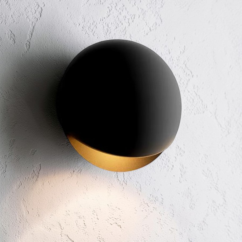 https://cdn.shopify.com/s/files/1/0655/0464/1076/files/eclipse-waterproof-modern-outdoor-wall-lamp-8738547.jpg?v=1774455615