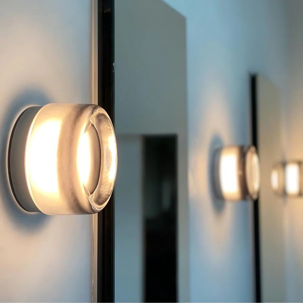 https://cdn.shopify.com/s/files/1/0655/0464/1076/files/frosted-glass-wall-sconce_2.jpg?v=1773242774