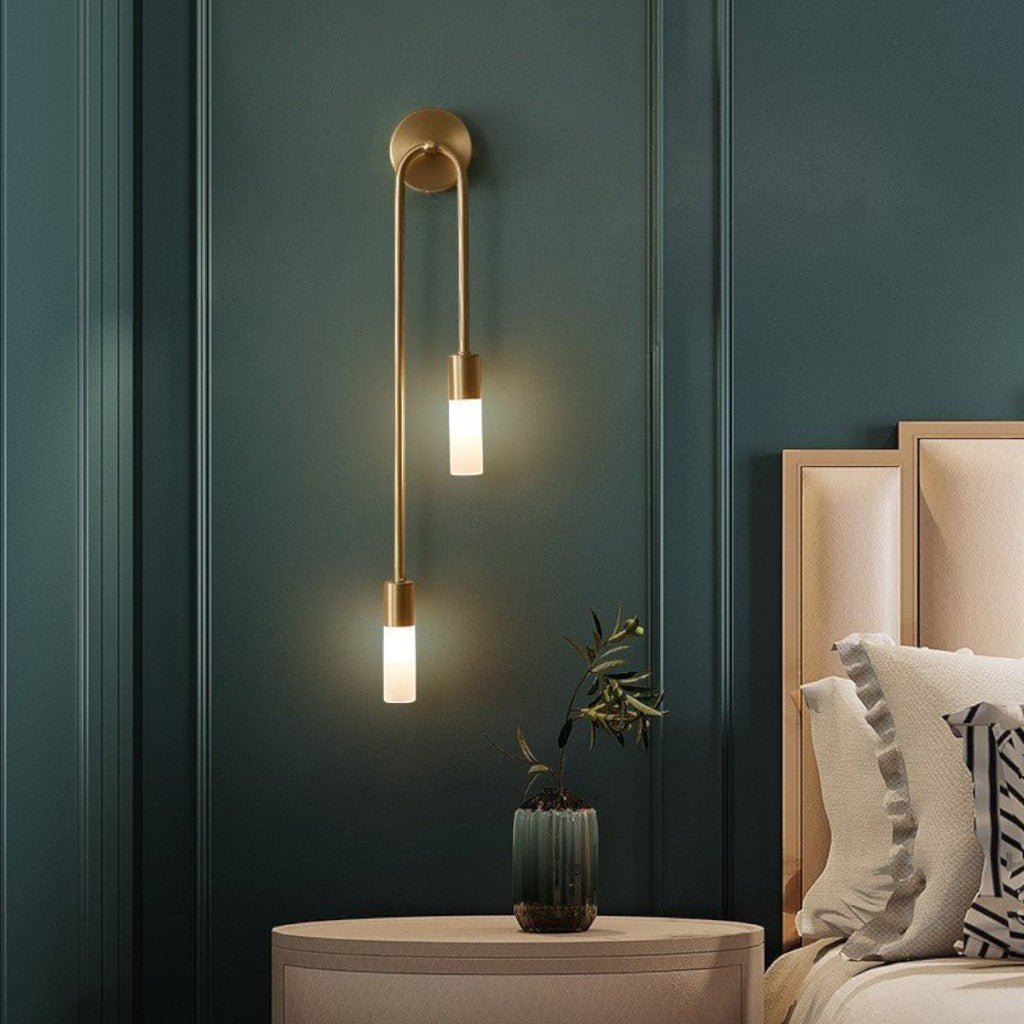https://cdn.shopify.com/s/files/1/0655/0464/1076/files/gold-wall-sconce-with-double-frosted-glass-cylinders_9.jpg?v=1773242837