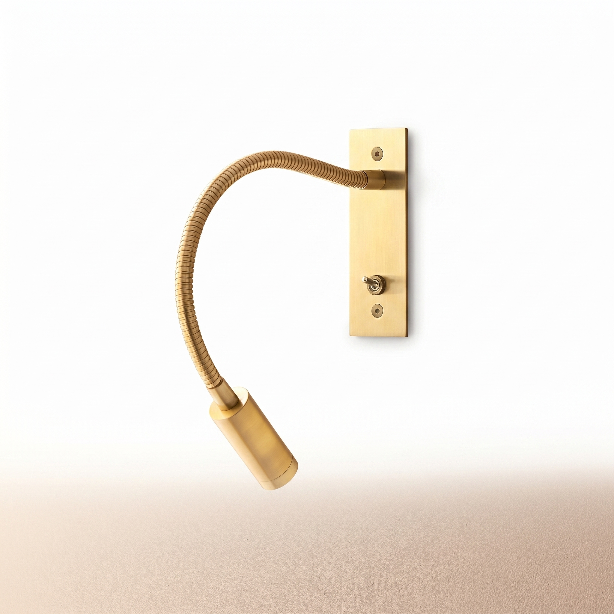 Penombra adjustable wall reading light in antique brass finish, white background