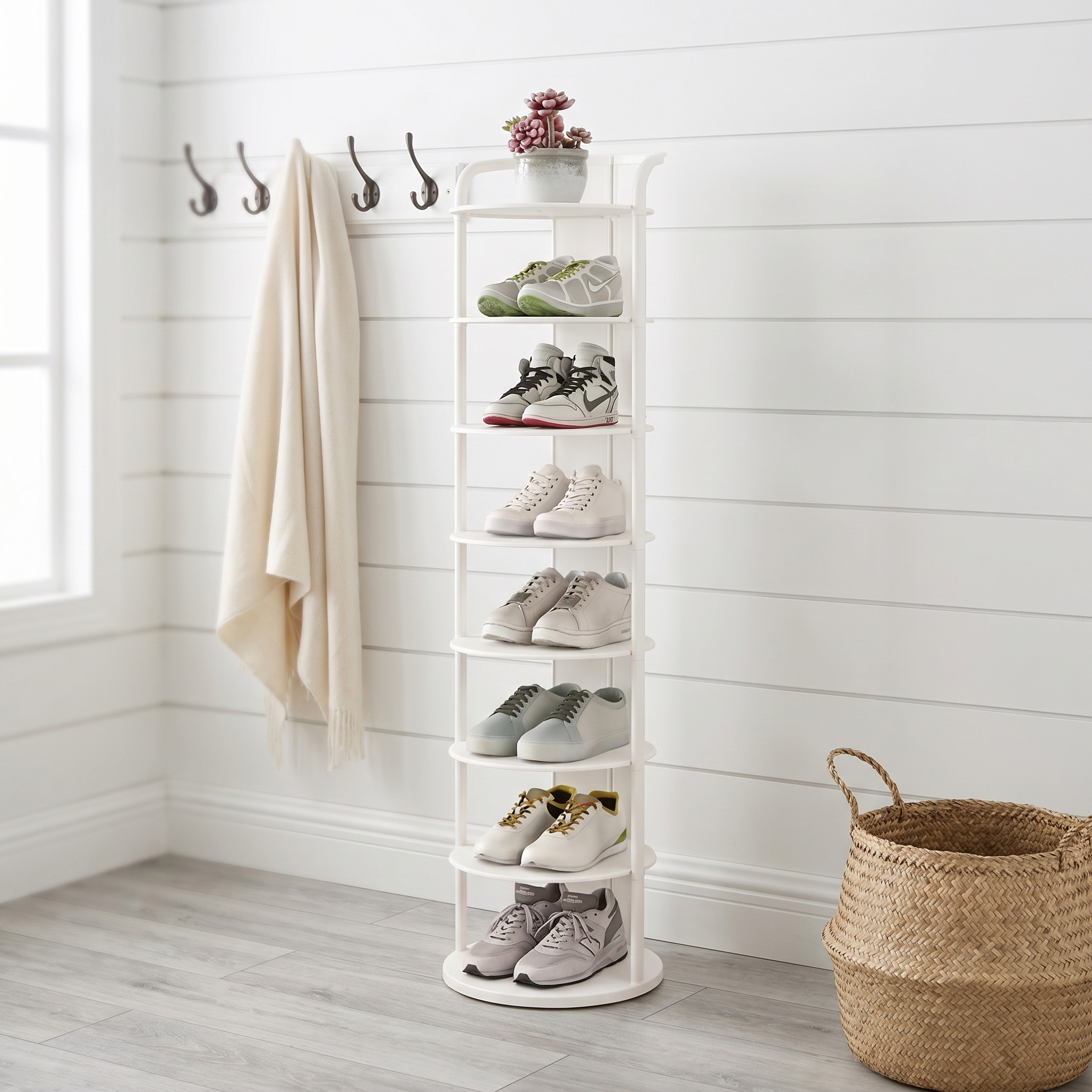 White round tiered shoe rack in a bright modern mudroom