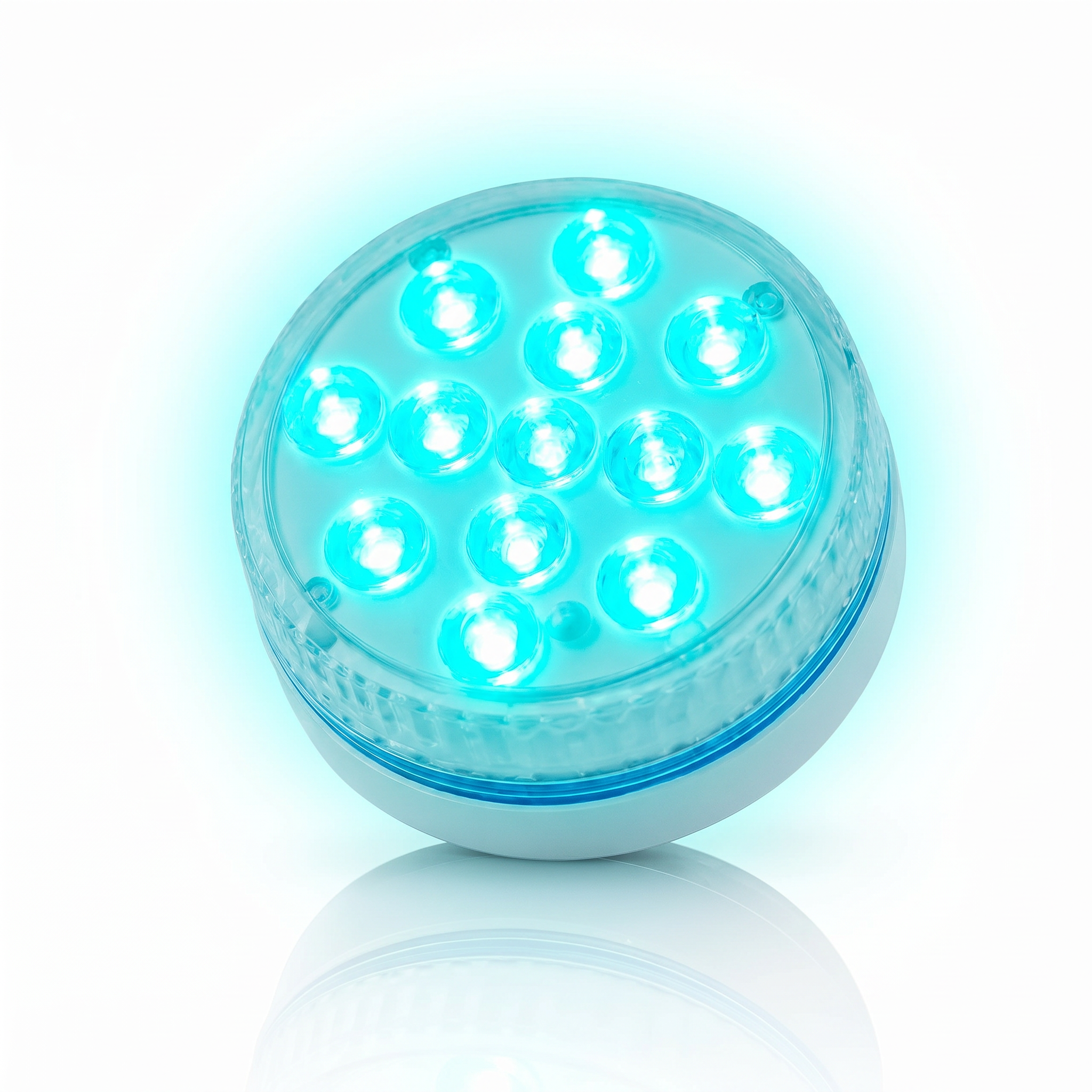 Onda Lucente submersible pool LED light glowing aqua on a white background