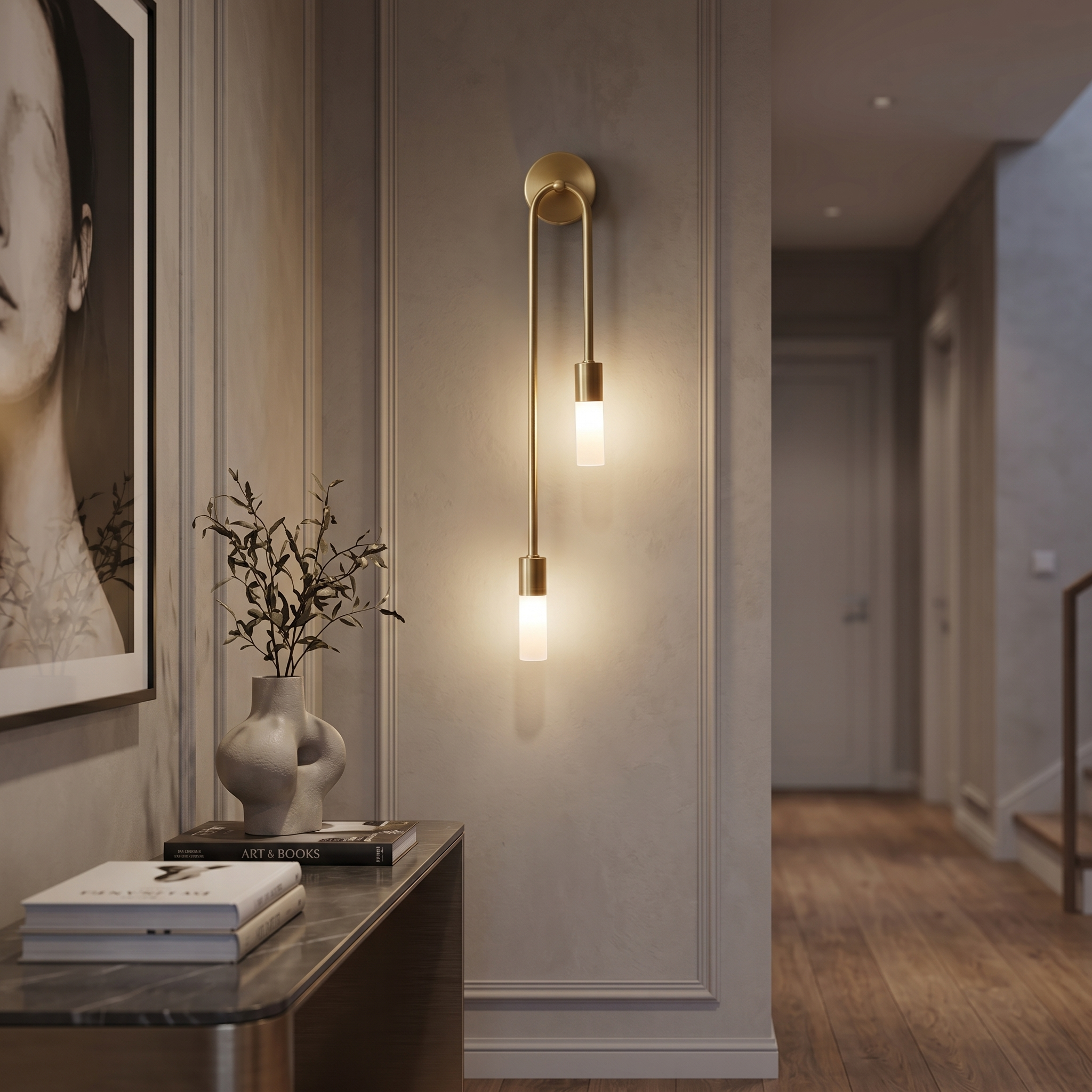 Carezza Luminosa gold wall sconce in an elegant hallway at dusk