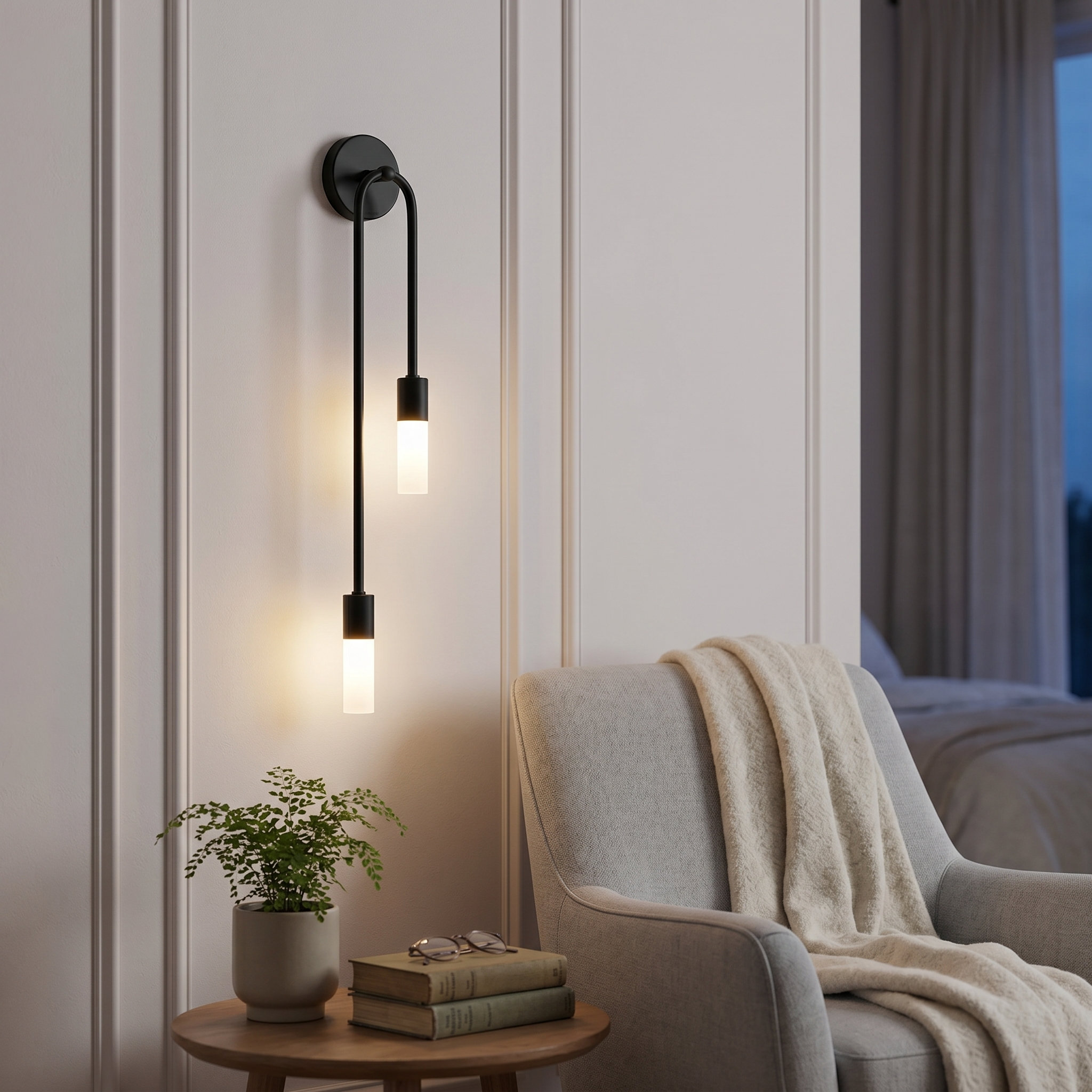 Carezza Luminosa black wall sconce beside a cozy reading corner