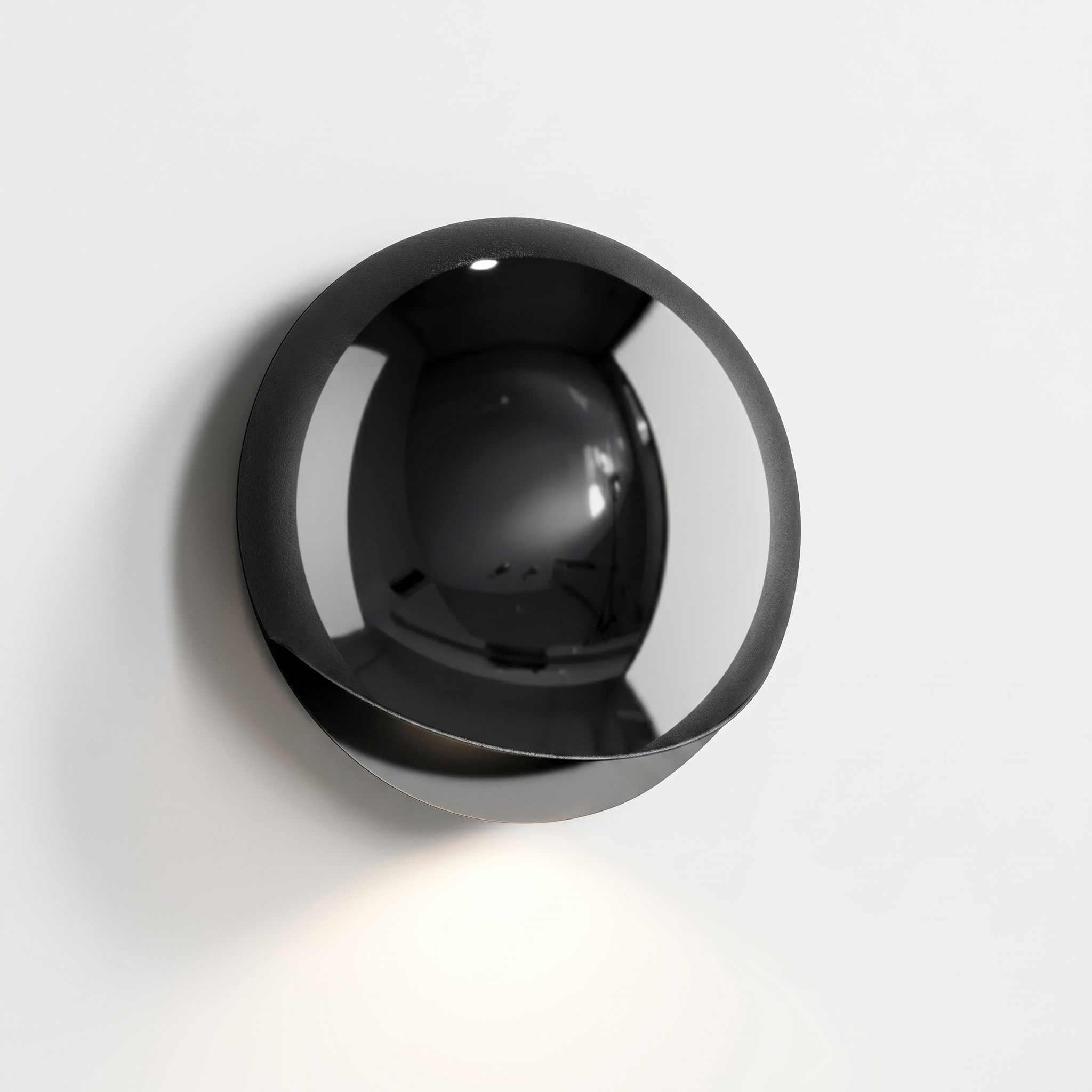 Eclissi outdoor wall light in Pearl Black — studio hero