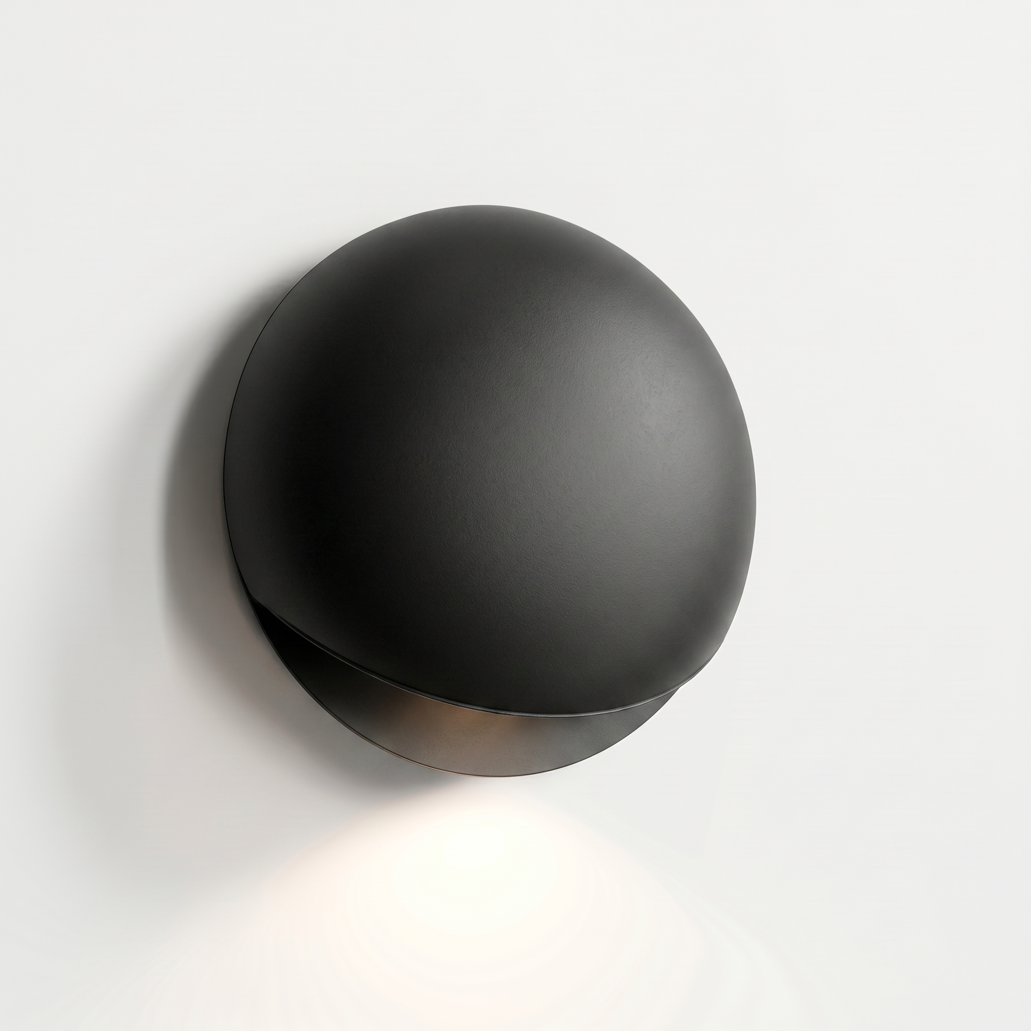 Eclissi outdoor wall light in Matte Black — studio hero