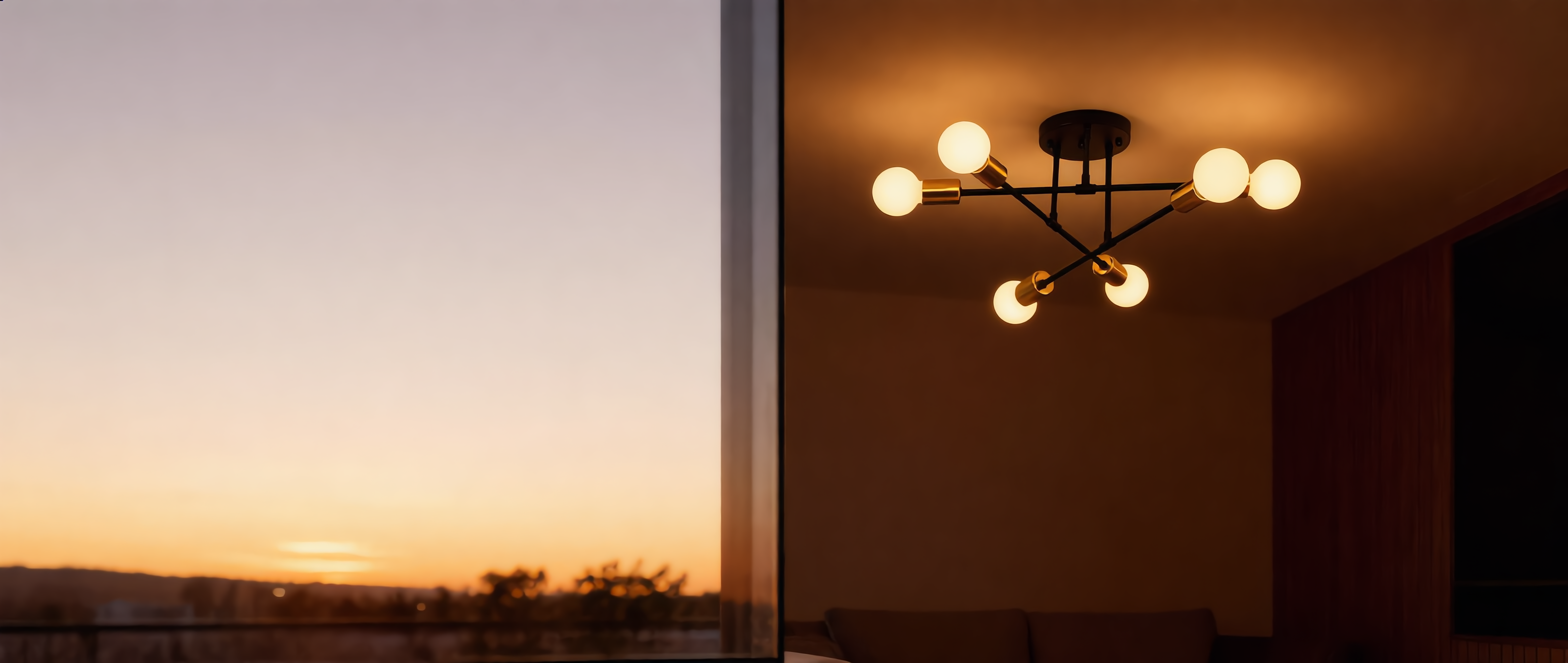 Raggiera Sputnik mid-century ceiling light glowing warm in a stylish modern room, widescreen banner