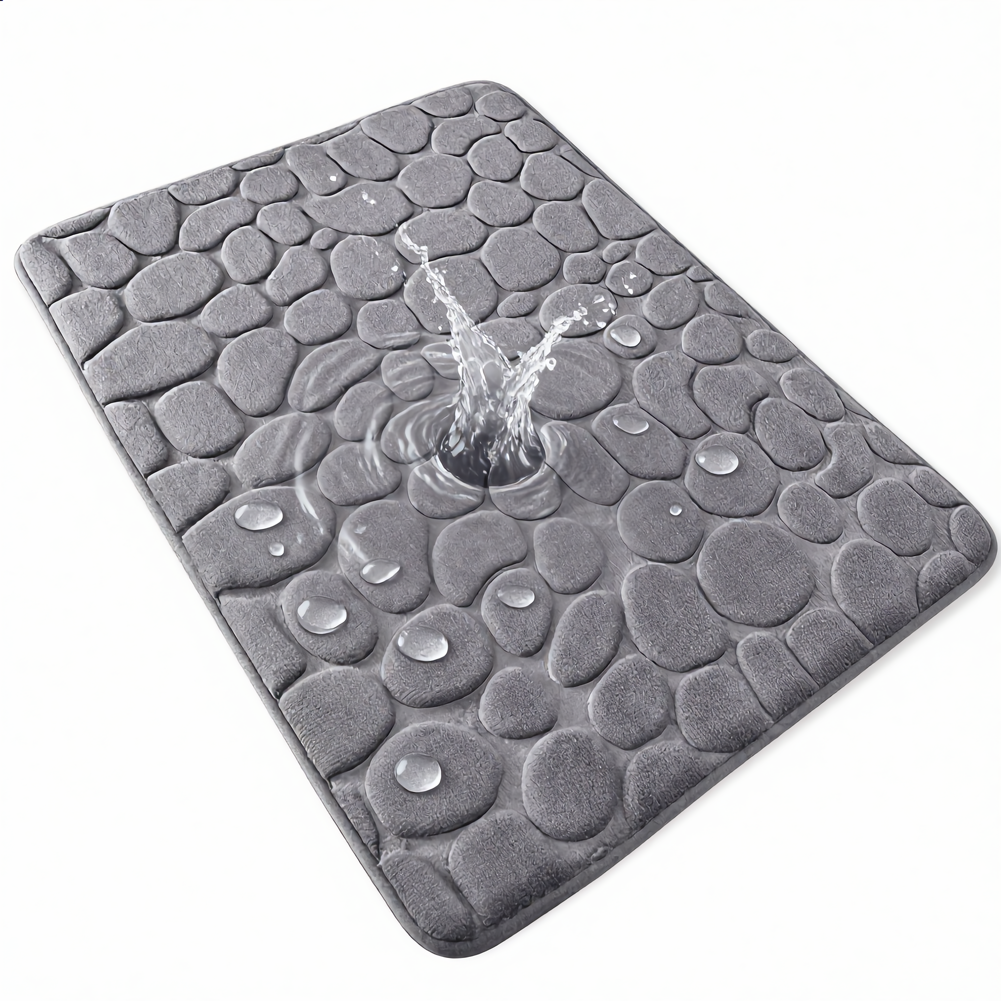Water droplets beading on the quick-dry absorbent surface of the bath mat