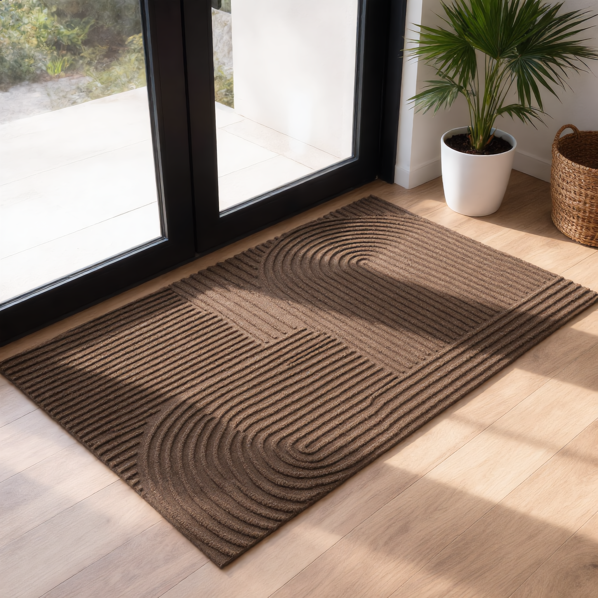Brown Arcs doormat in a modern entryway by a glass patio door