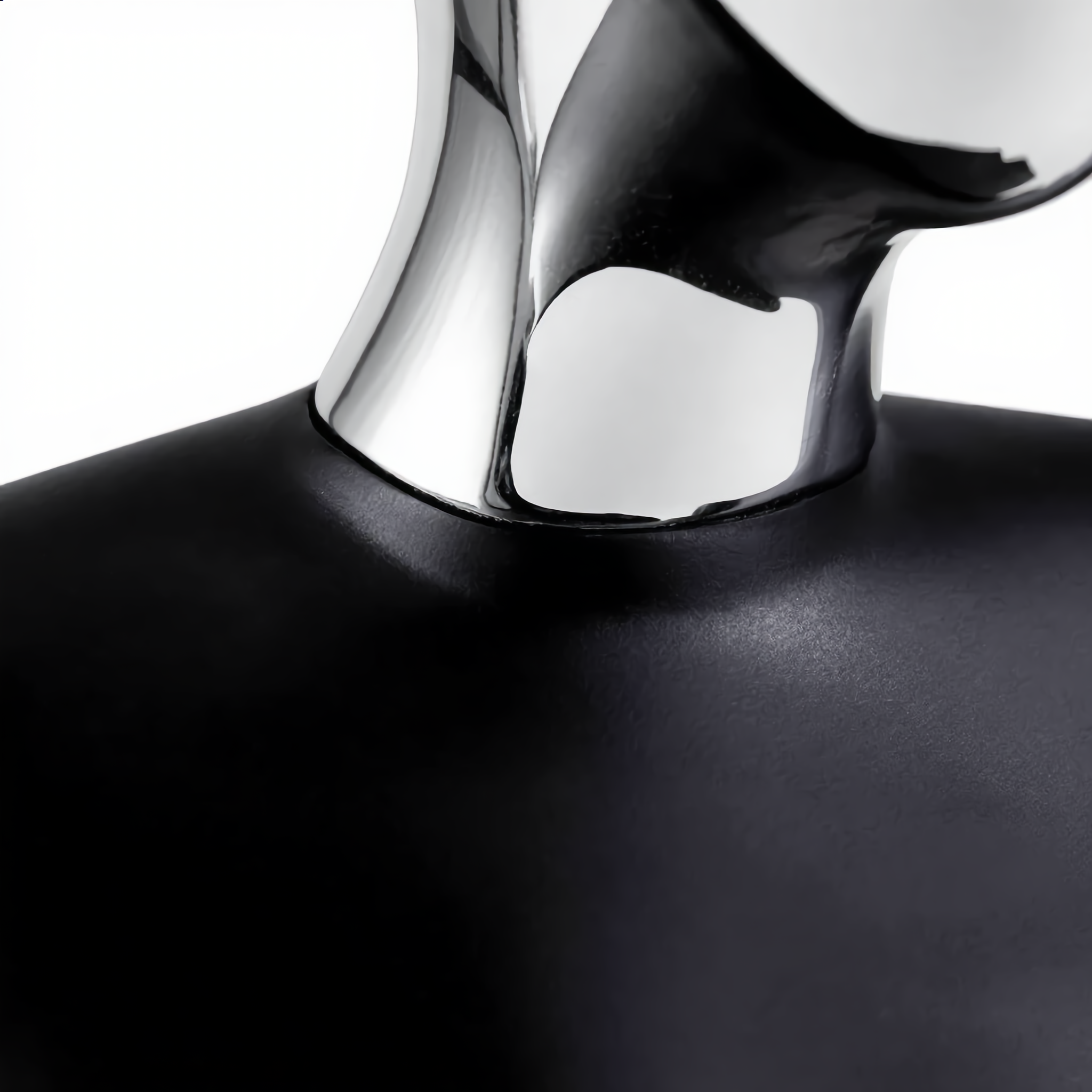 Close-up of the polished chrome head and matte black body