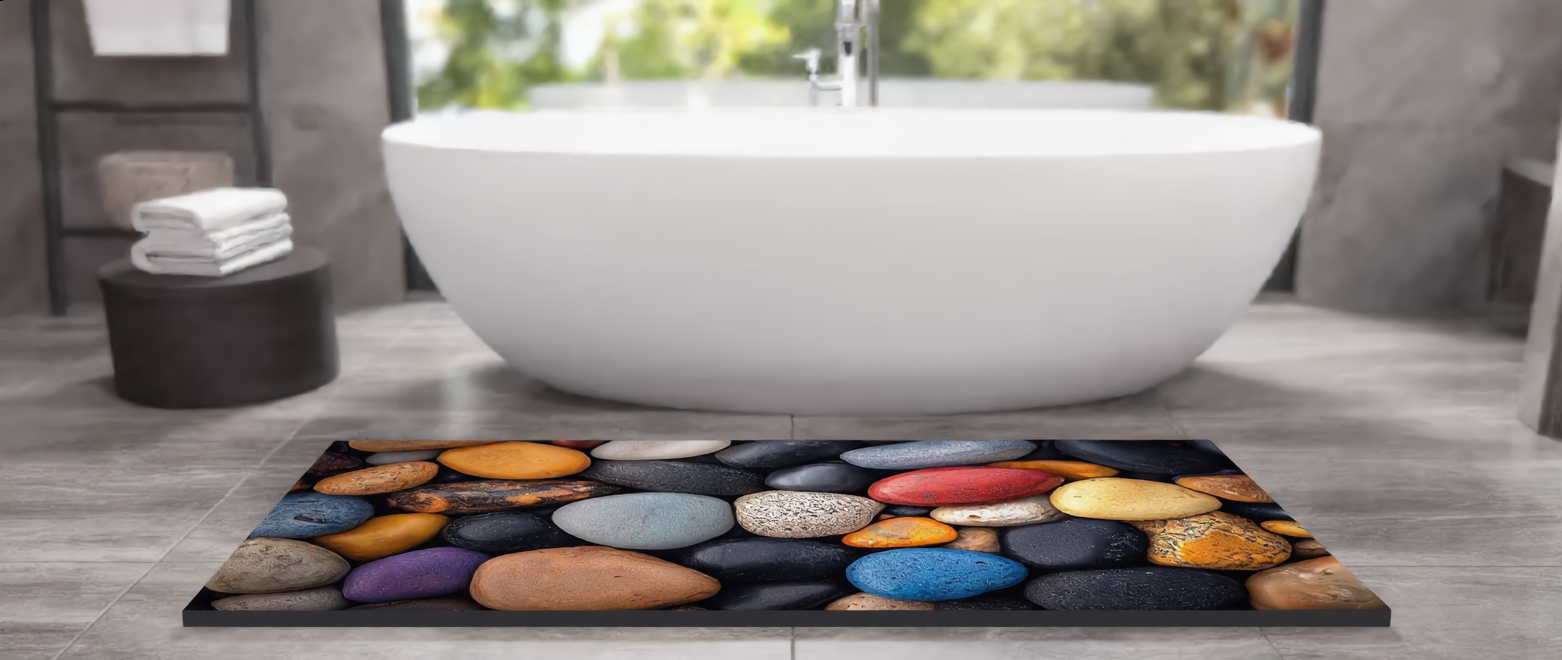 Riviera Stone Bath Mat styled in a serene modern bathroom in front of a freestanding tub