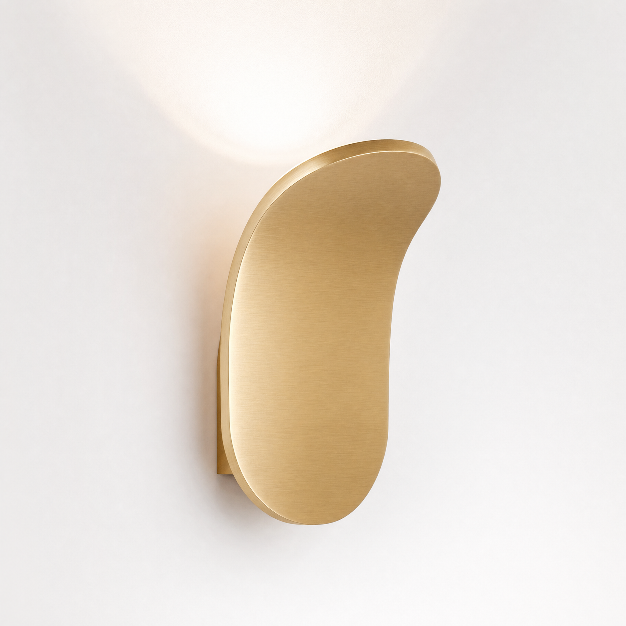Gold curved wall sconce neutral white glow