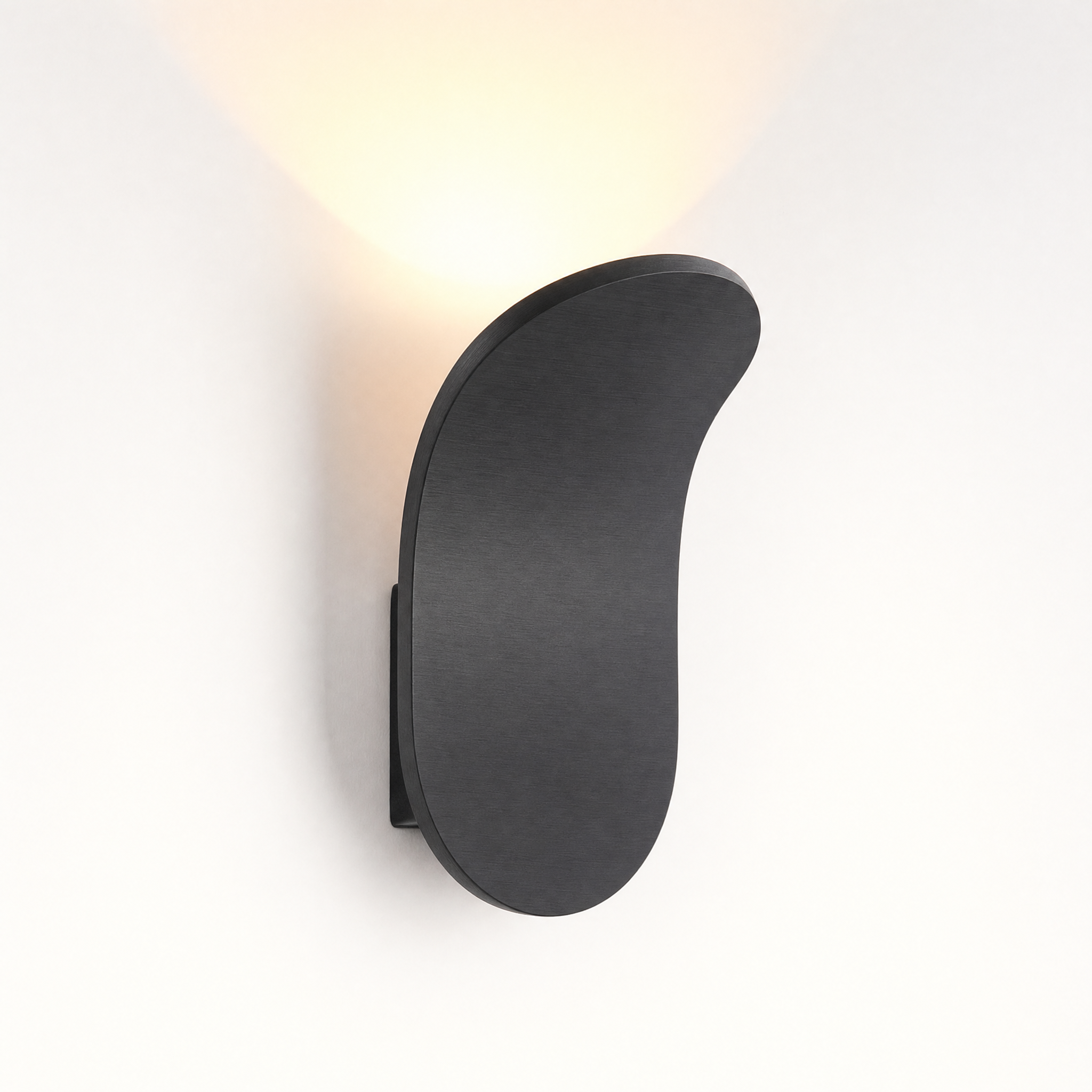 Matte black curved wall sconce warm white glow