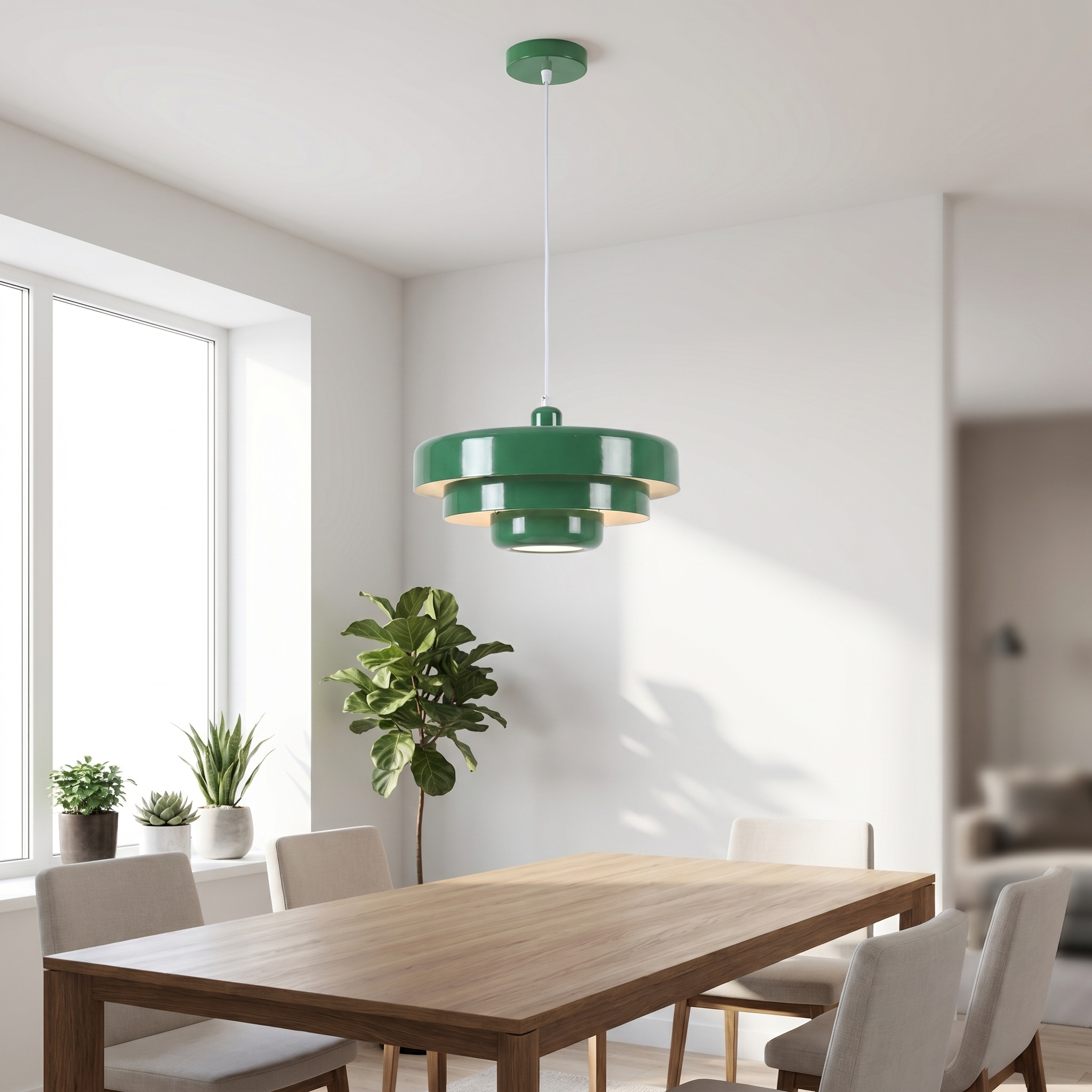 Green macaron pendant light over a dining table in a bright modern room