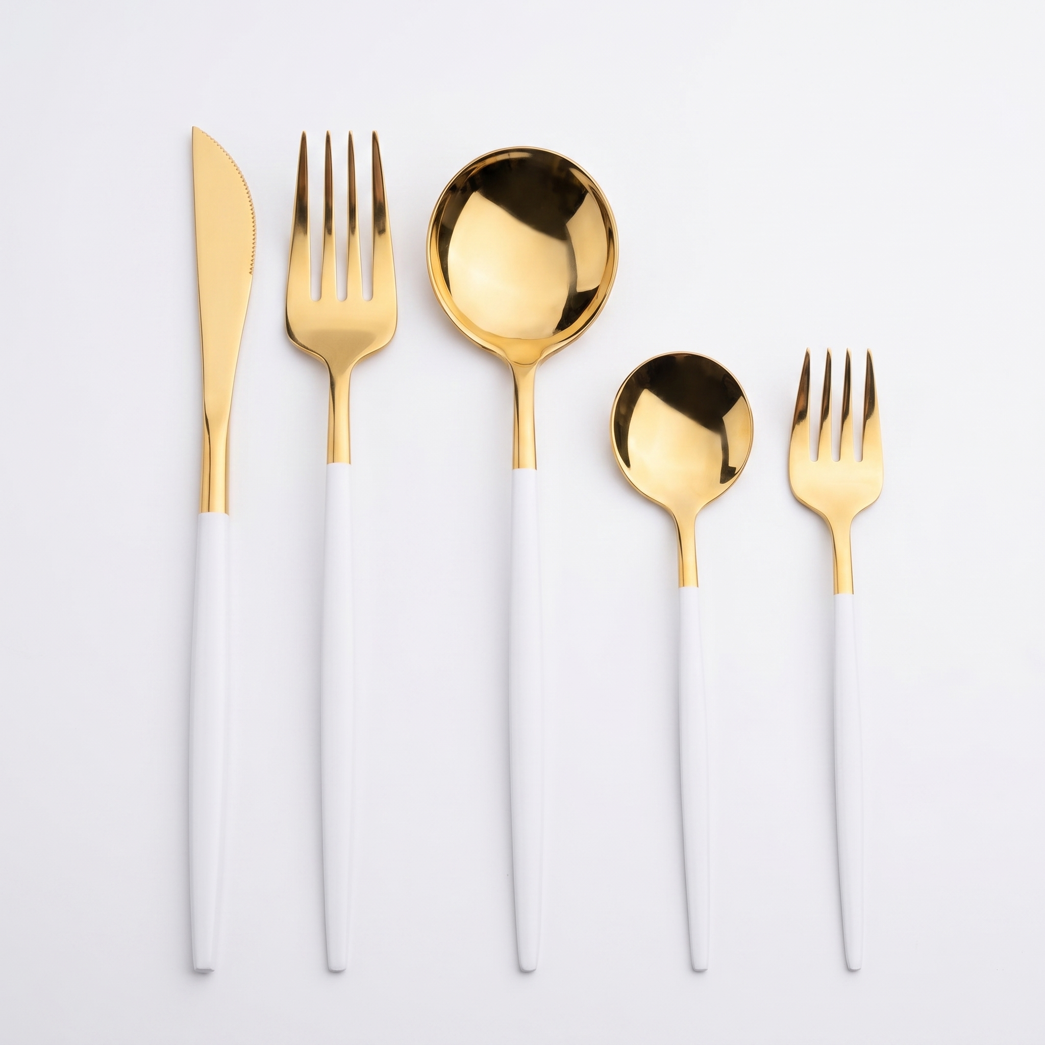 Aurelia white and gold five-piece place setting on white background