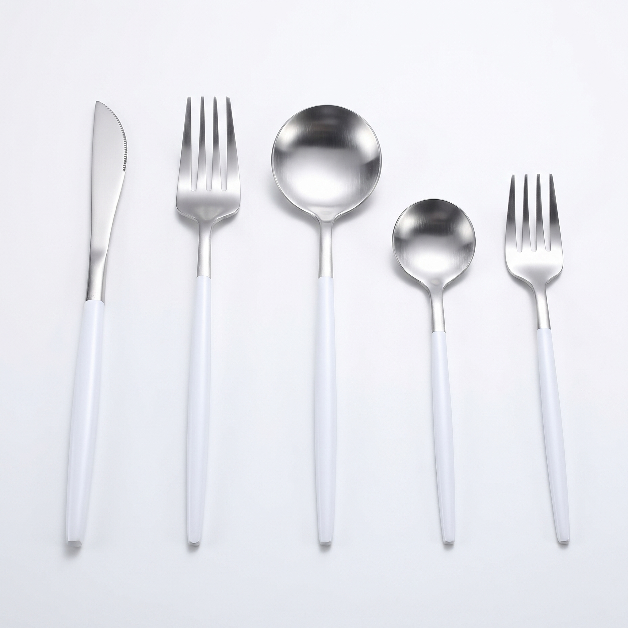 Argenta white and silver five-piece place setting on white background