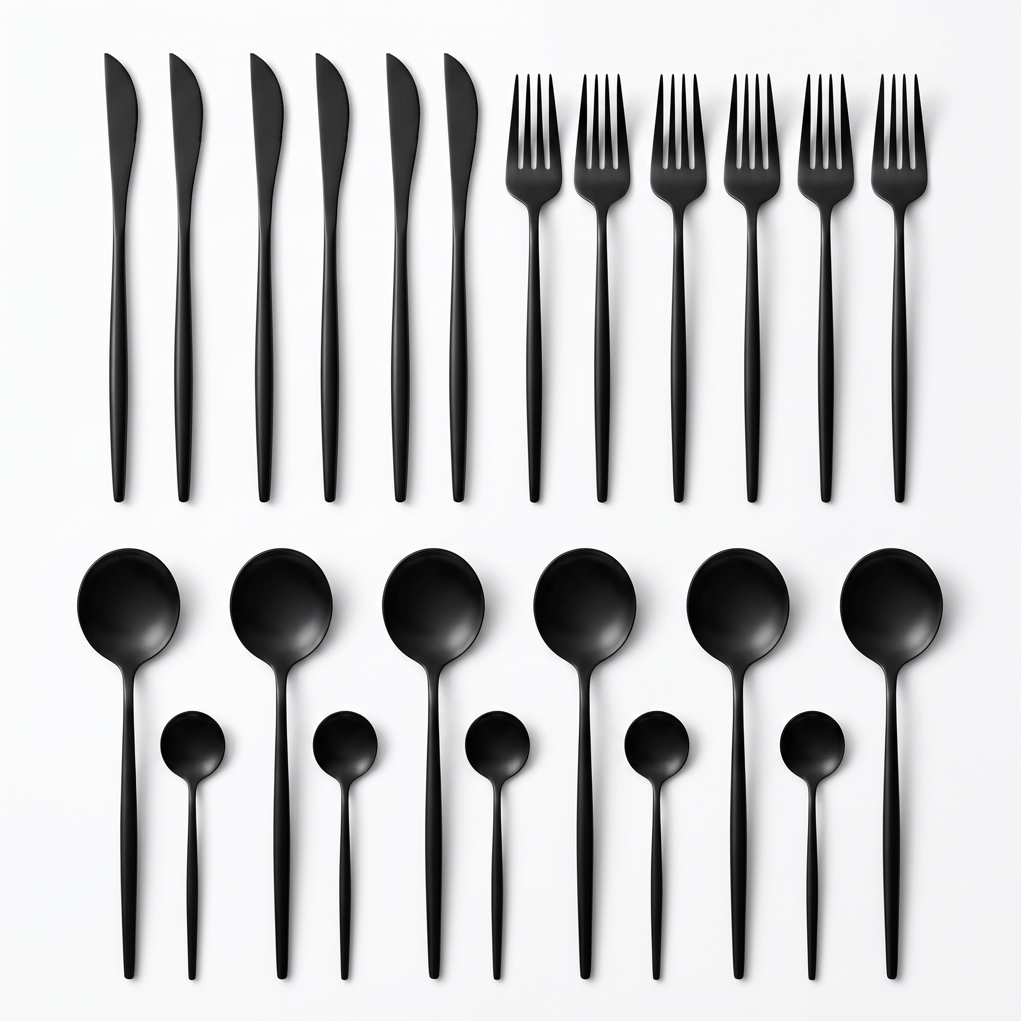 Onice 24-piece matte black flatware set on white