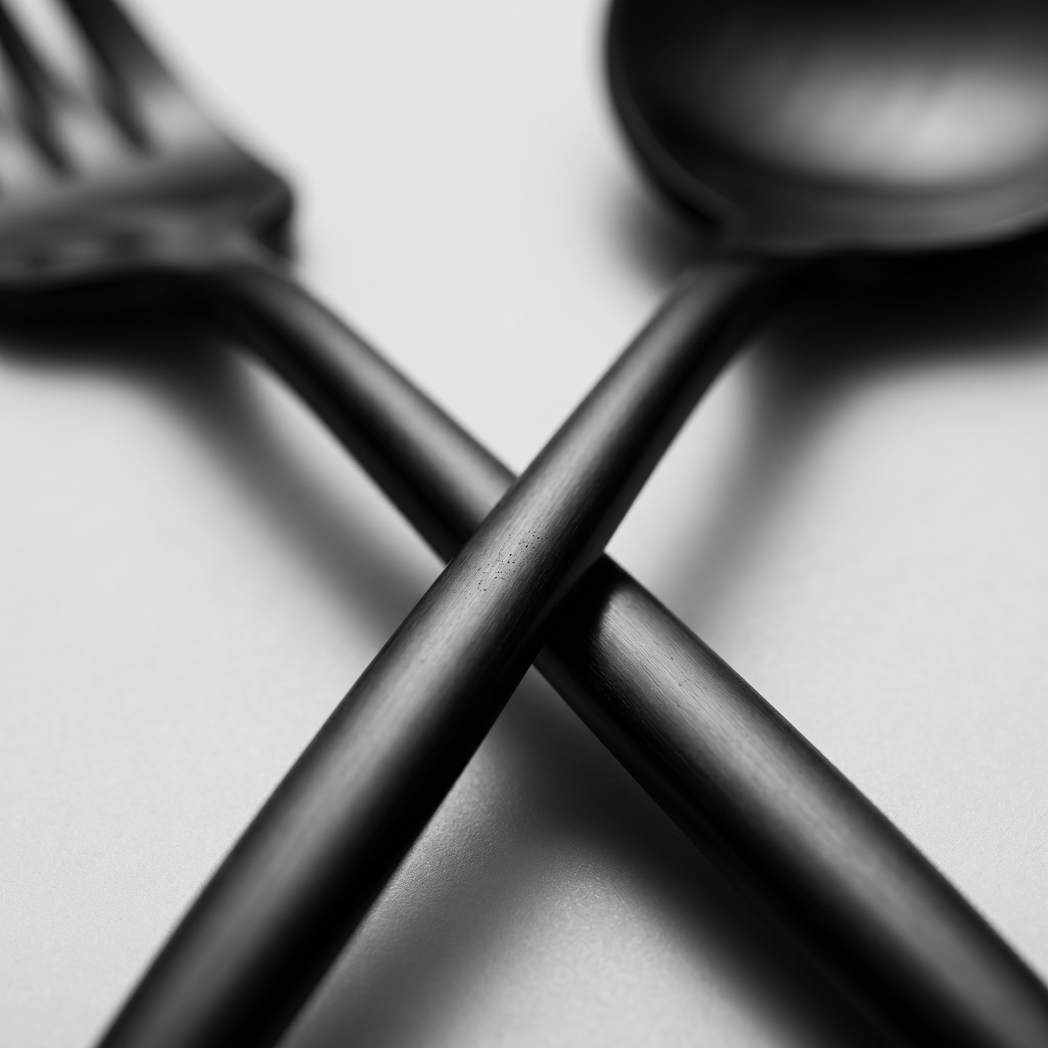 Matte black flatware finish detail macro