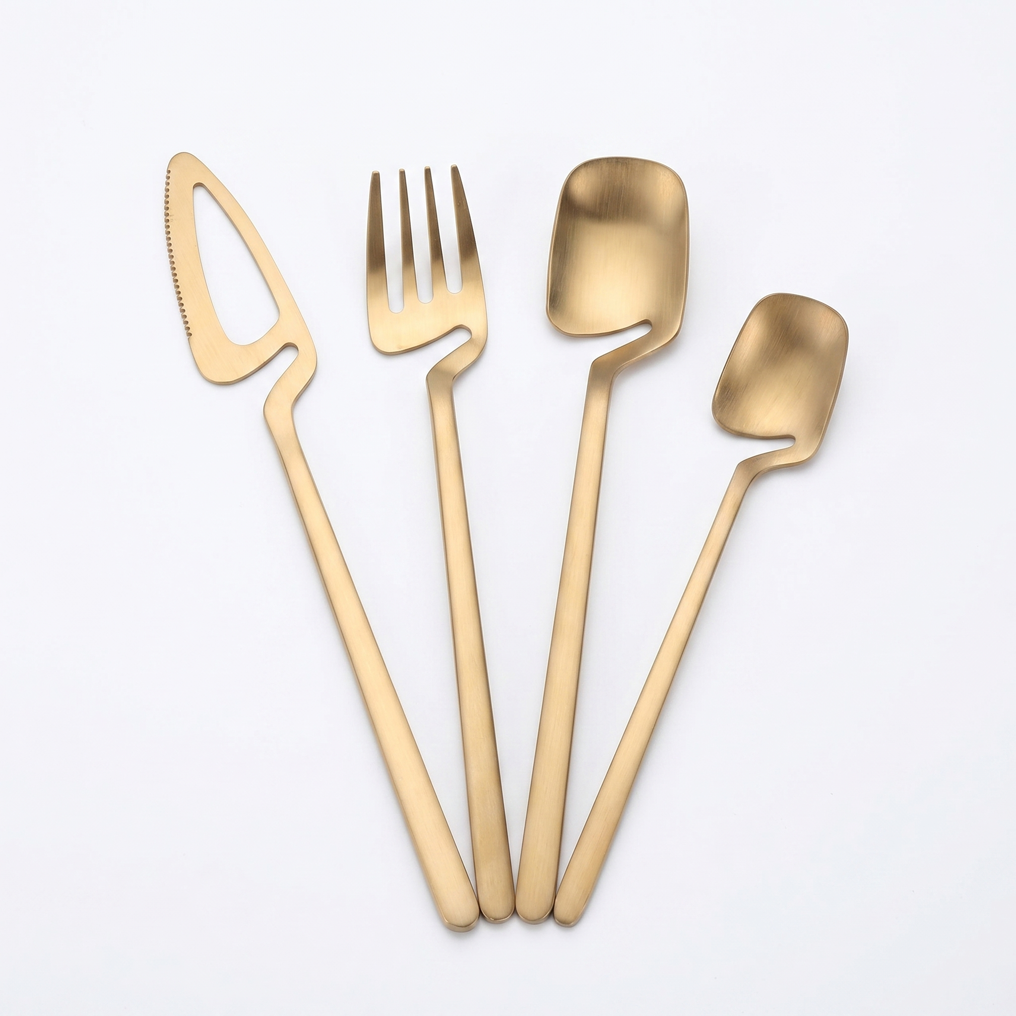 Linea sculptural skeleton cutlery set gold stainless steel