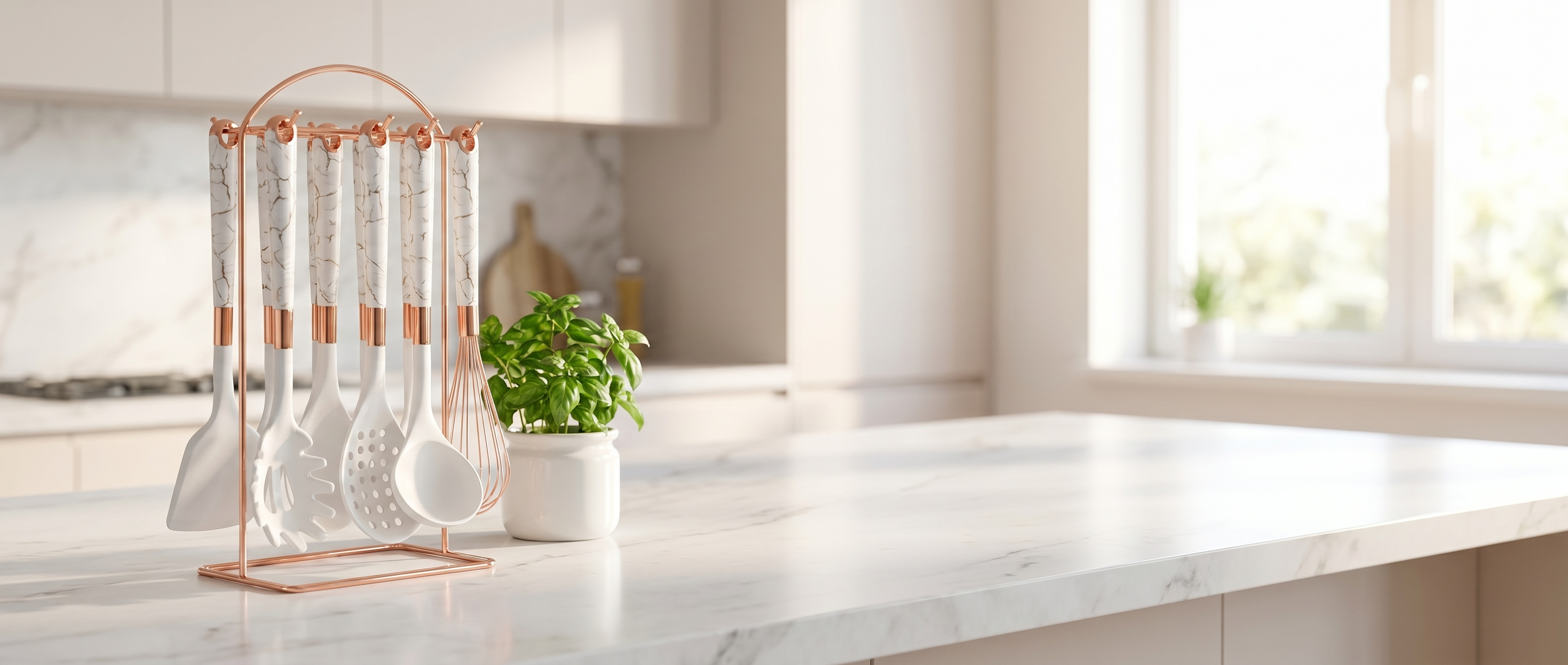 Marmo rose gold kitchen utensil set banner in a bright kitchen