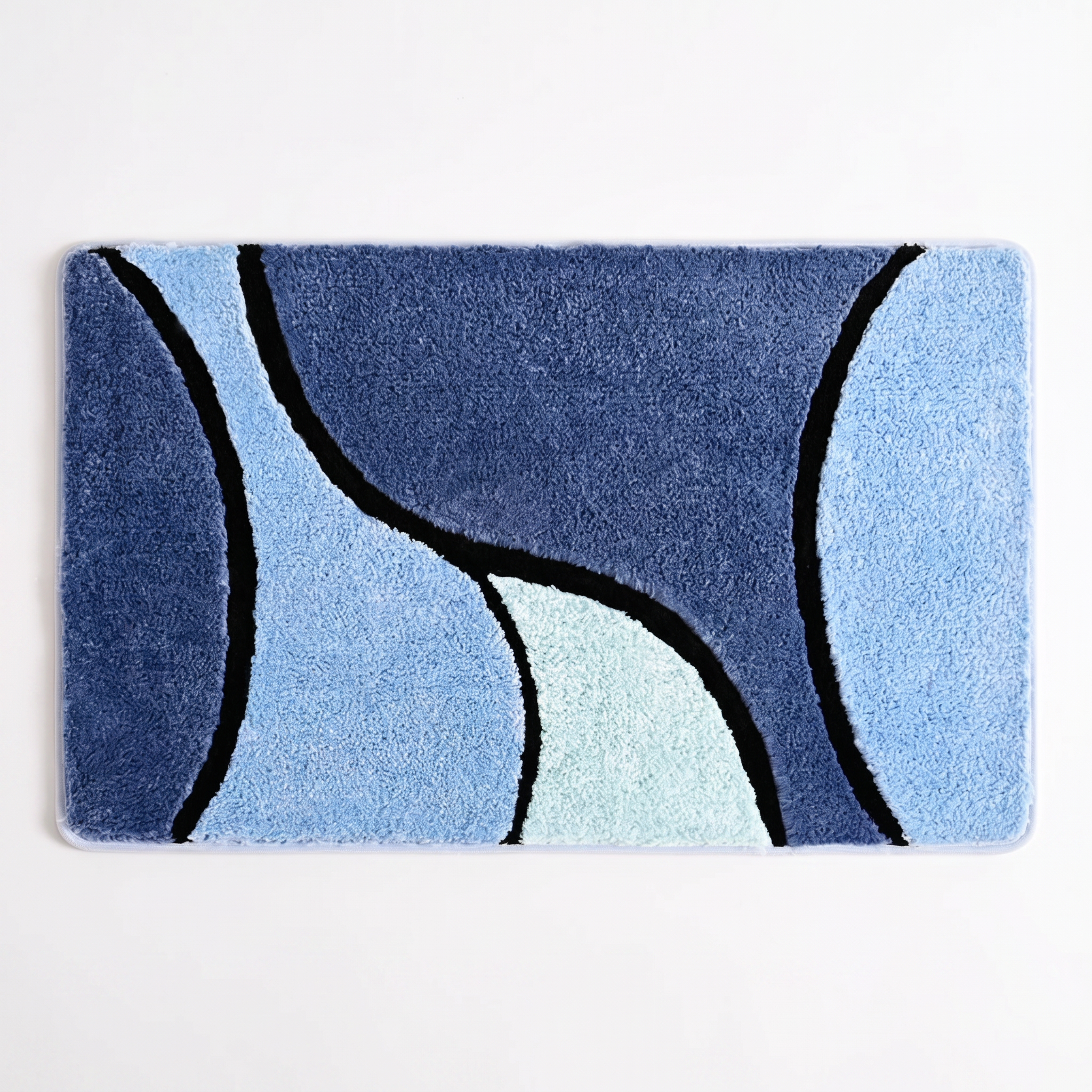 Marea Plush Wave Bath Mat in Ocean Mist blue, studio hero