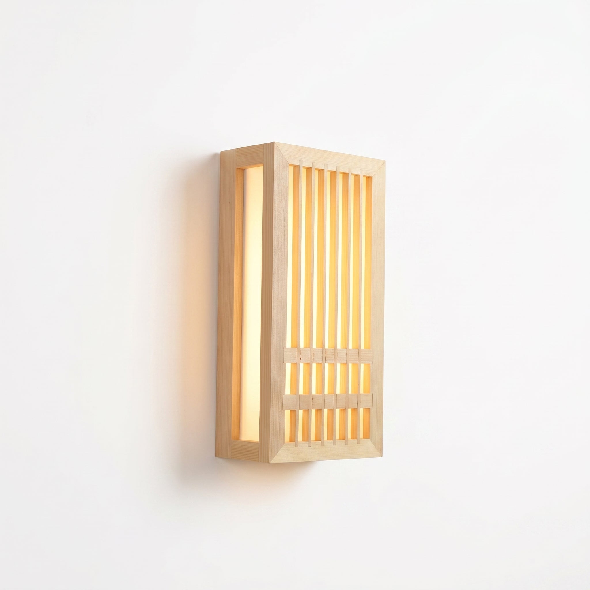 Luminara wood lantern wall sconce, warm light, studio hero