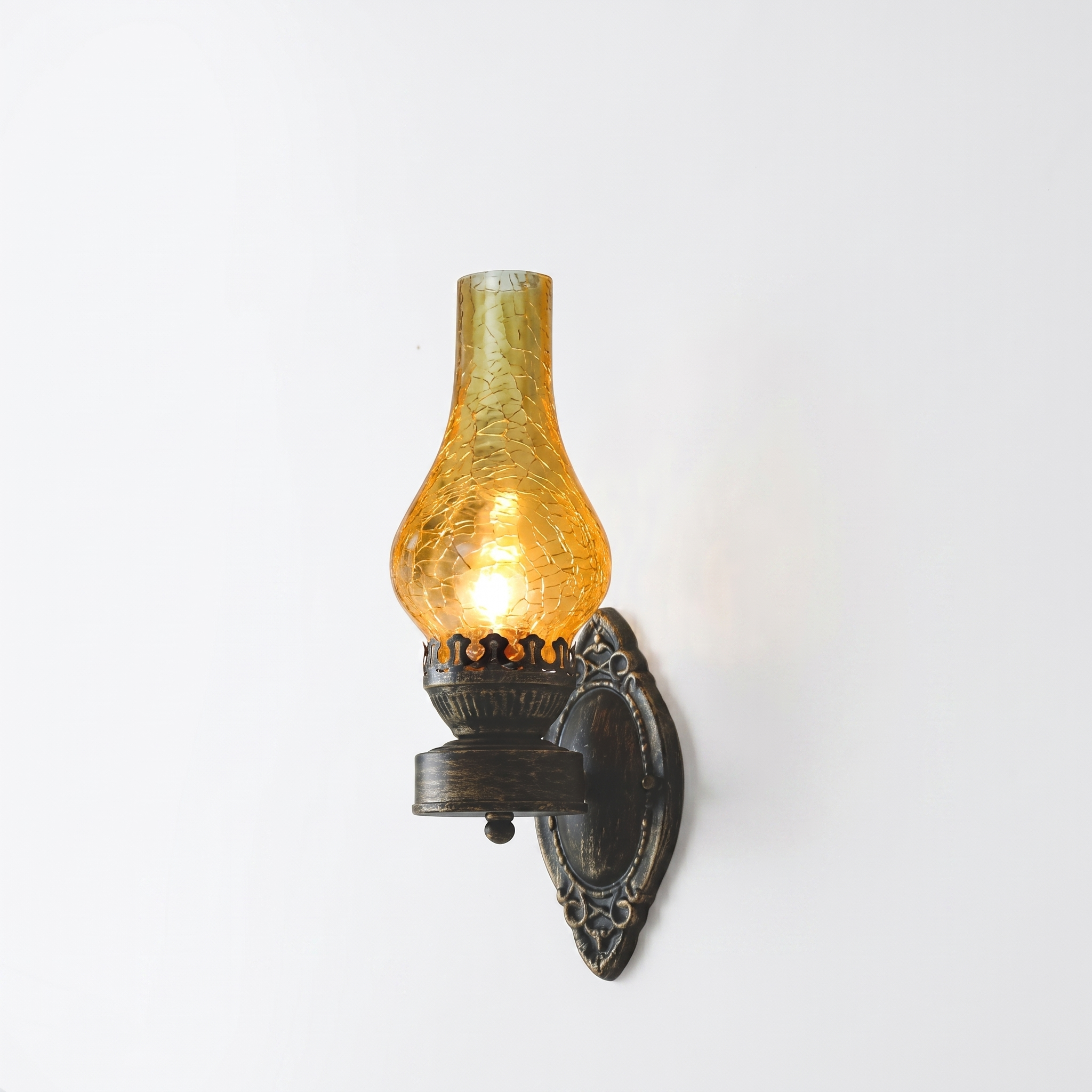 Lucerna vintage bronze wall sconce, tea crackle glass shade, studio hero
