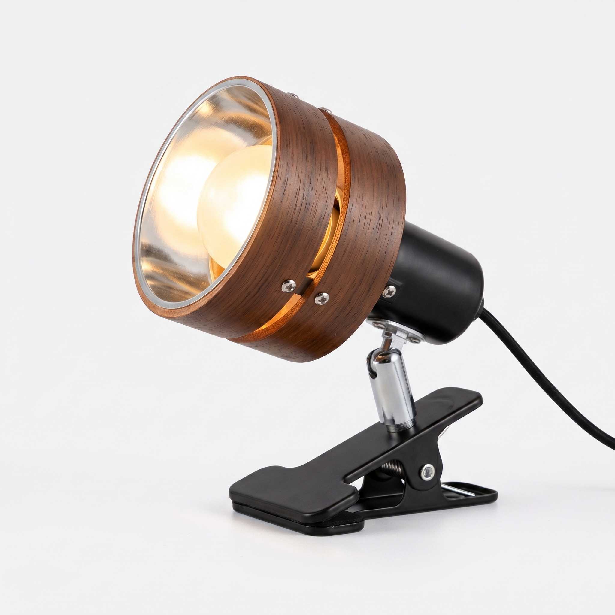 Bosco walnut wood clip-on reading lamp, lit, on white