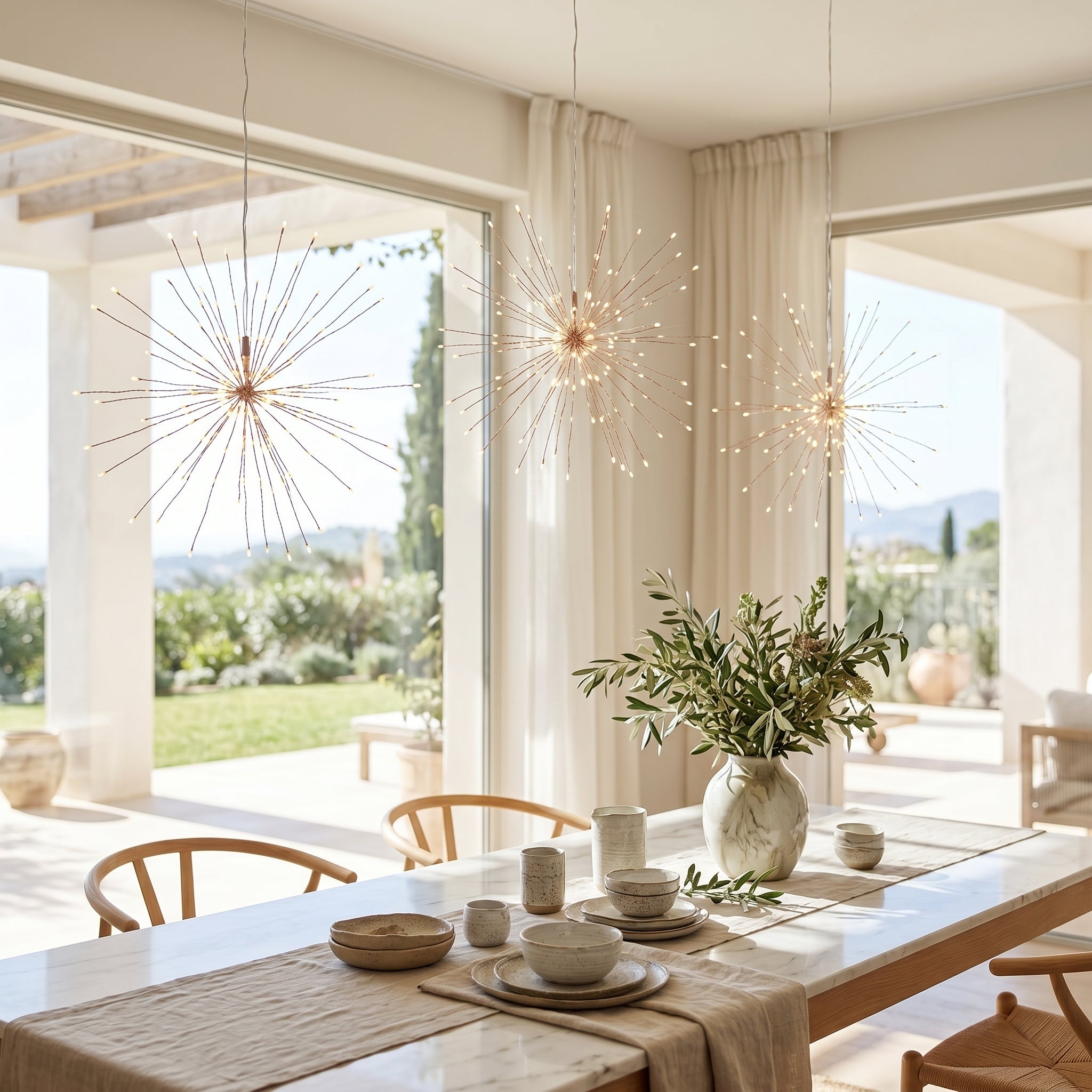 Scintilla starburst lights over a bright Mediterranean dining table